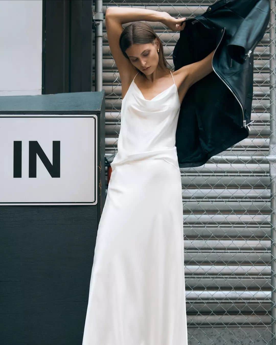 サスアンドバイドのインスタグラム：「ESCAPED LOVE | The Escaped Love story introduces the season’s most covetable pairing; style the cami and skirt together for the illusion of a dress, and layer with a classic leather jacket for undeniable cool. #Winter23 #sassandbide」