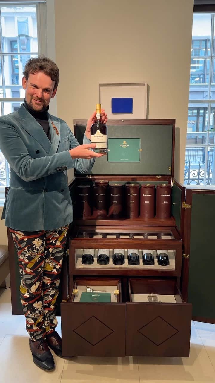 クリスティーズのインスタグラム：「It’s Wine Time 🍷    Christie’s Wine Department are delighted to present a Spring auction of wines and spirits in London.    To celebrate their 200th year, Graham’s has released a limited-edition Bicentenary Collection Cabinet. An extremely rare release containing 12 historic ports with only 30 editions created.    Meticulously designed by Portuguese master-joiners, this cabinet is made of santos rosewood.    ➡️Graham’s Bicentenary Cabinet. Estimate: £25,000-£30,000.   🗓 Finest and Rarest Wines & Spirits, Live Auction: 25 Apr 10:00 AM (BST).    @christieswine @c.t.foley @grahams_port #wine #wines #port」