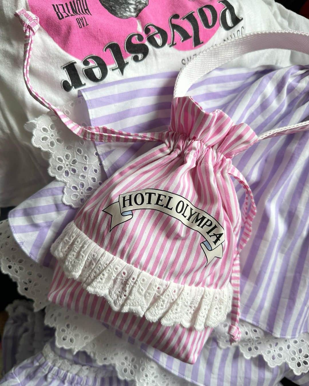 オランピアルタンのインスタグラム：「This little candy striped drawstring pouch will make its debut at @thehotelolympia pop-up which opens next Friday at @isetan_the_space in Tokyo ♥️🏩💕 #thehotelolympia #tokyomylove #isetanthespace」