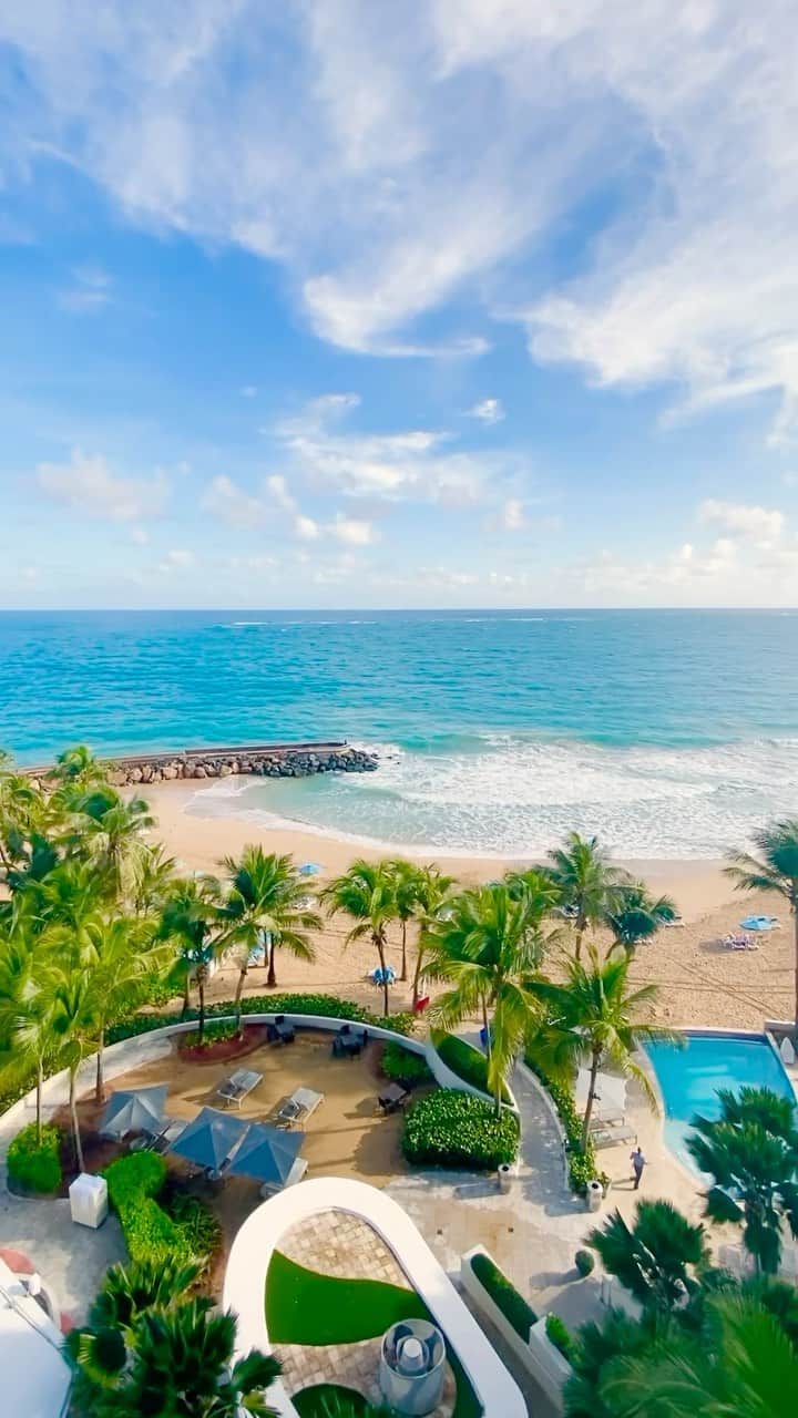 BEAUTIFUL HOTELSのインスタグラム：「A sight like no other. 🤩 @sallytrubella captures La Concha Resort, “your quintessential San Juan beachfront playground, and a hot nightlife destination.” 🇵🇷  The La Concha Resort is known for providing an unparalleled tropical experience, with its luxurious amenities, stunning views, and warm hospitality. 🏖️ From the hotel pool to the palm trees, every detail is designed to transport you to a state of complete relaxation. 🌴 Whether you’re looking to soak up the sun on the beach or explore the island’s natural beauty, this resort has something for everyone. 🌺🐠  Do you prefer to stay by the pool or beach when you’re on vacation? 🌊   📽 @sallytrubella 📍 @laconcharesort, Puerto Rico 🎶 lonelyplanet - Original audio」