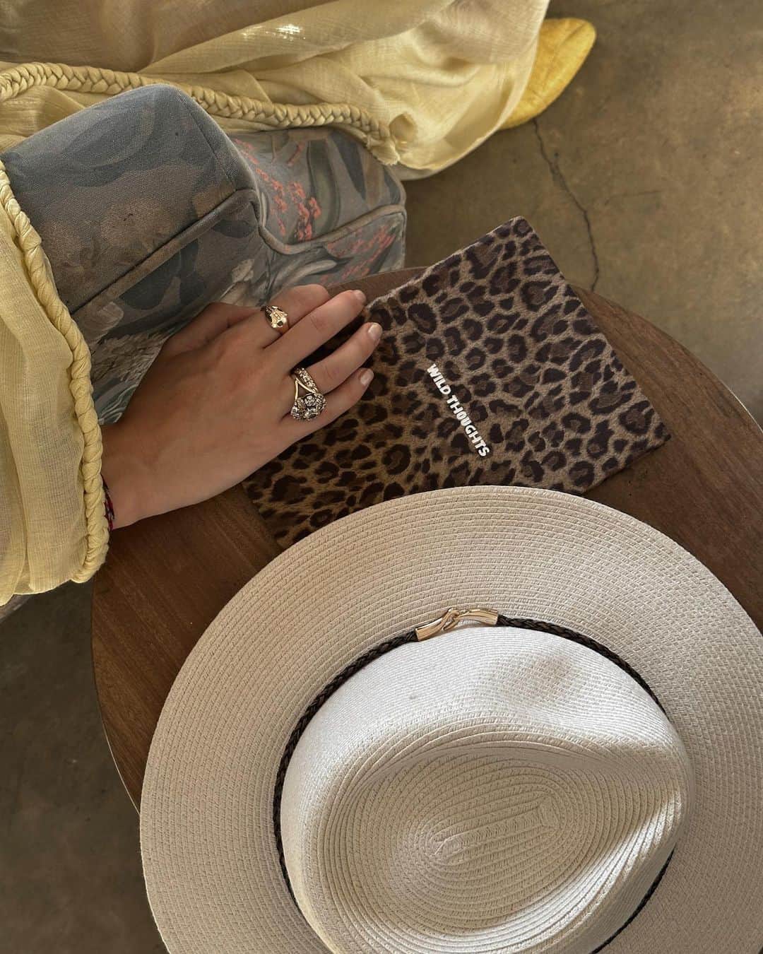 のインスタグラム：「While creating every trip, thoroughly planning each itinerary, every time with Murad we imagine ourselves as fairy tale heroes of some adventure story. We think through all the minute details and create name-brand merchandise for our guests.  This time there were the scarfs designed by me, safari panamas and dairies for recording the best memories. Any ideas about our next destination?  Планируя каждое путешествие и кропотливо прописывая маршрут, мы с Мурадом каждый раз чувствуем себя героями волшебной сказки и приключений 🕊️ Продумываем все детали и делаем именной мерчендайз для наших гостей. В этот раз были платки – мой дизайн, панамы для сафари и ежедневники для записи лучших моментов! Как вы думаете, куда будет следующее путешествие?」