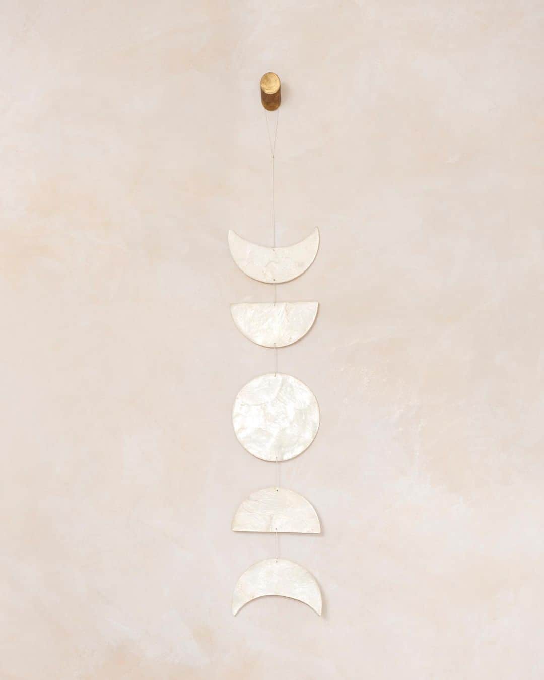 The Little Marketのインスタグラム：「For sweet dreams and wall décor, our capiz wall hanging is perfect for any room of the home. From the nursery to the entryway, this piece illuminates a space and is made from stunning capiz shells.」