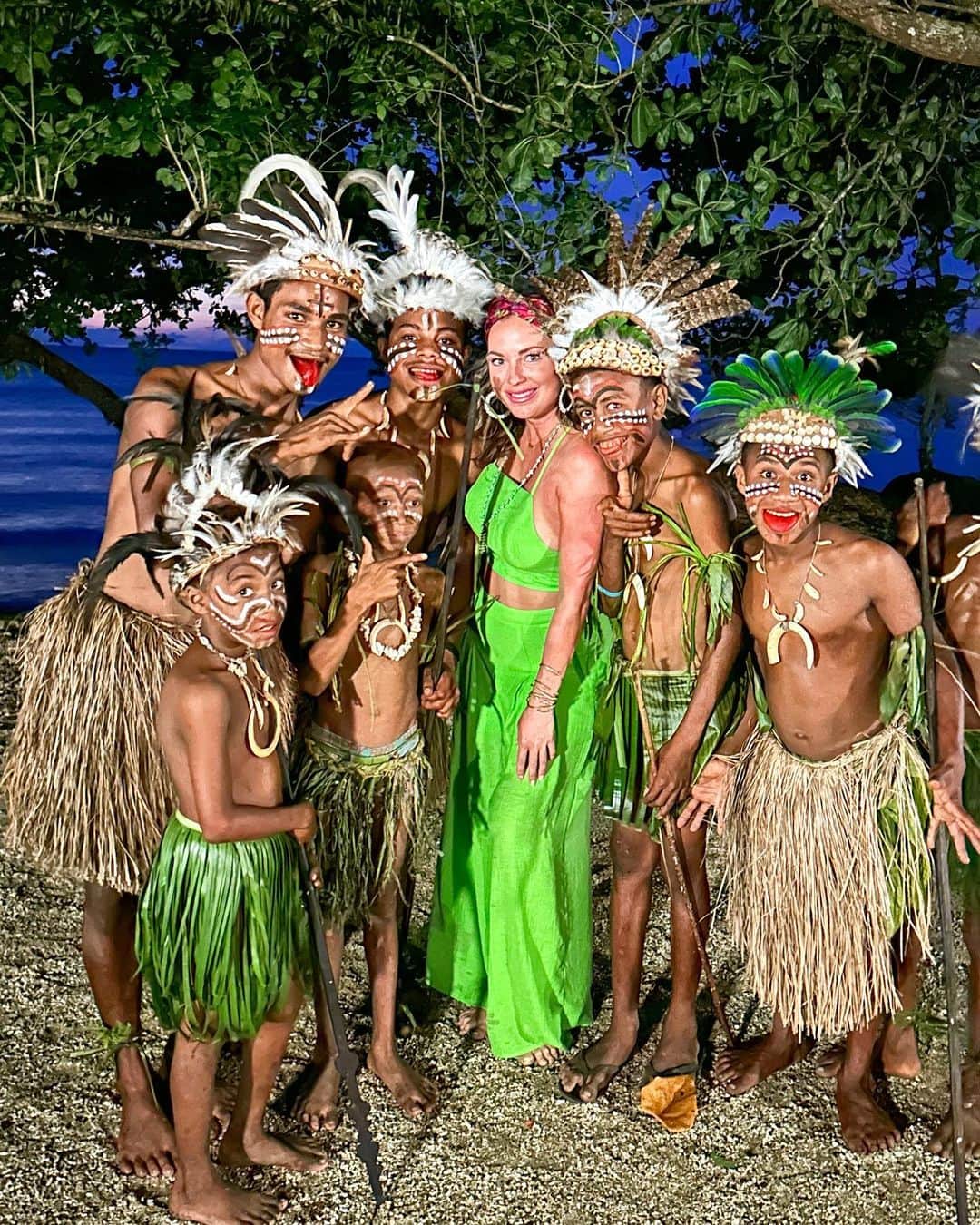 アリサ・ラモスのインスタグラム：「Some favorite photos from Milne Bay, Papua New Guinea 🇵🇬💖  This area wasn’t part of our original plans, but to be fair, we were kind of making up the plans as we went. I learned it is crucial to be flexible and patient in PNG!  We were supposed to go to the Highlands to see some of the tribes, but our flights kept getting cancelled, so we jumped on a flight to Milne Bay, and I’m so glad we did!  It took a plane, bus, and boat to get to the island we were staying at, then another boat to get to the remote area where these photos were taken.   They are:  1. A tribe who lives nearby (photo permission asked) 2. The hidden waterfall 3. Skull cave from cannibalism (in the past) 4. A crashed plane (no one injured) 5. A local’s cockatoo (there are many here)  See my blog post for more info on each & PNG in general!  Which photo/experience interests you the most?  (BTW their mouths are red from a cultural practice that involves chewing something called Betelnut, many people there do it! Supposedly it makes you feel tipsy for a few minutes 😜)  #papuanewguinea #png #mylifesatravelmovie #globalcitizen #pngtribal #pngtribalfoundation #pngproud #pngpride #beautifuldestinations #bucketlist」