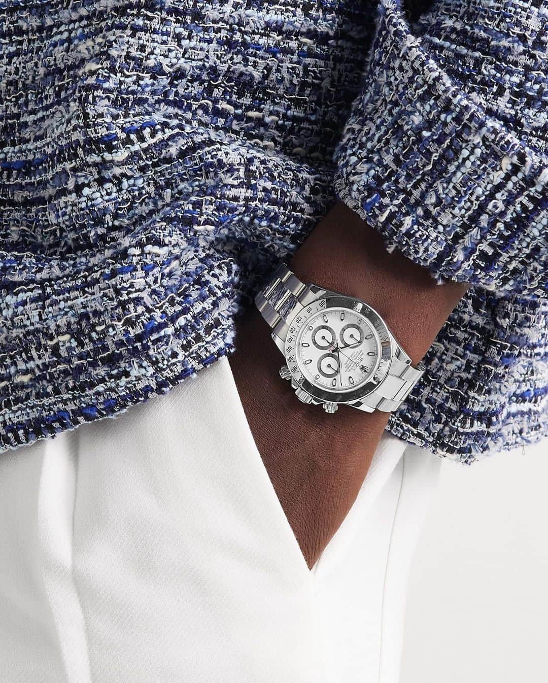 MR PORTERのインスタグラム：「@rolex's 'Daytona' watch debuted at the renowned trade fair, Baselworld, in 2000 - it was built with the first, exclusive in-house movement from the brand in over 50 years. A pre-owned model sourced by Wind Vintage, this reference is made from signature Oystersteel and features an etched tachymeter scale along the bezel. The white dial features luminous hands and indices and 60-second, 30-minute and 12-hour counters. This watch and its water-resistant seals are vintage, so we do not recommend wearing it in water. Available now at MR PORTER (within the US only) - link in bio.」
