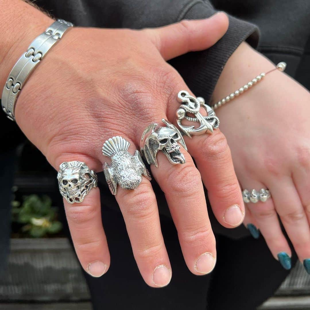 クレイジーピッグのインスタグラム：「Great to have friends of Crazy Pig Designs in store today. We made a Boomslang Snake Ring, Three Skull Tudor Ring, Small Cross with Garnet Ring, a re-size and re-polish all taken home same day. The collections are growing and getting stronger.  Thanks guys and see you soon! 👊🏼🔥 • • • • • #crazypigdesigns #london #silverring #925silver #silverjewellery #handmade #rockandroll #heavymetal #gothic #skulls #skullfashion #gemstone #coventgarden #snakering #lucifer #garnet #garnetring」