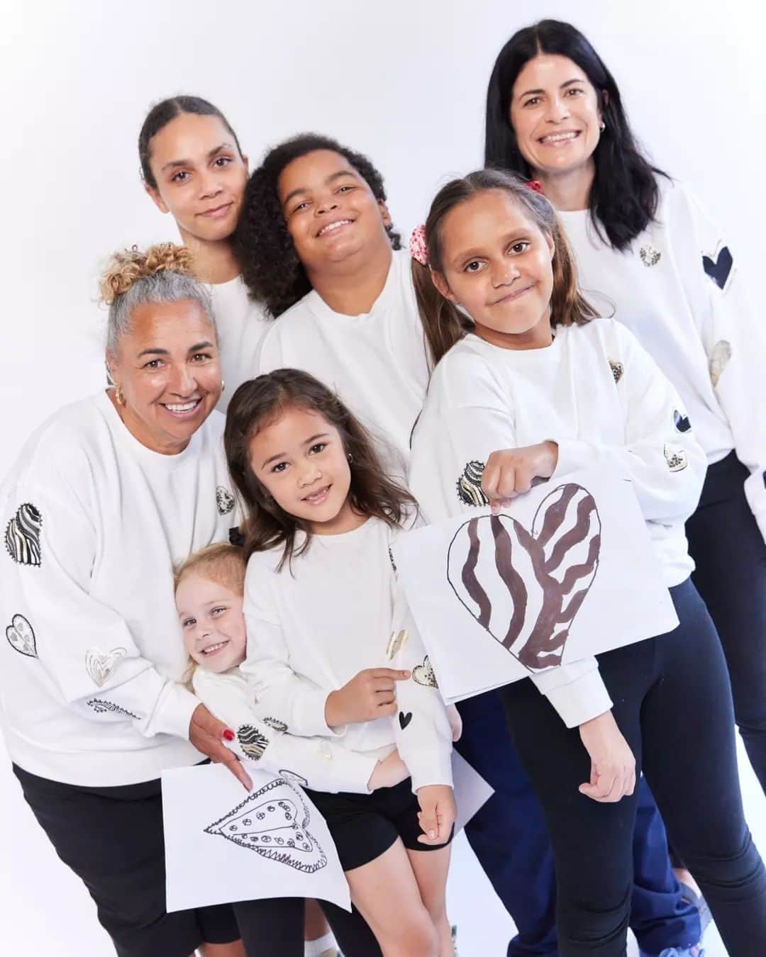 サスアンドバイドのインスタグラム：「THANK YOU | *SOLD OUT* Due to the overwhelming demand for our Barnardos sweaters, we have sold out of our Kind Hearts sweater. More sizes from XS through to XL will be available in the coming weeks.  Through a day of play and creativity, each Yurungai student drew their own heart designs to be placed on the sleeves of 2023’s Kind Hearts Sweater, crafted with embellished signature beading and black and gold detailing.  100% of the profits from the sales go directly to Barnardos Australia.   #sassandbidexbarnardos」