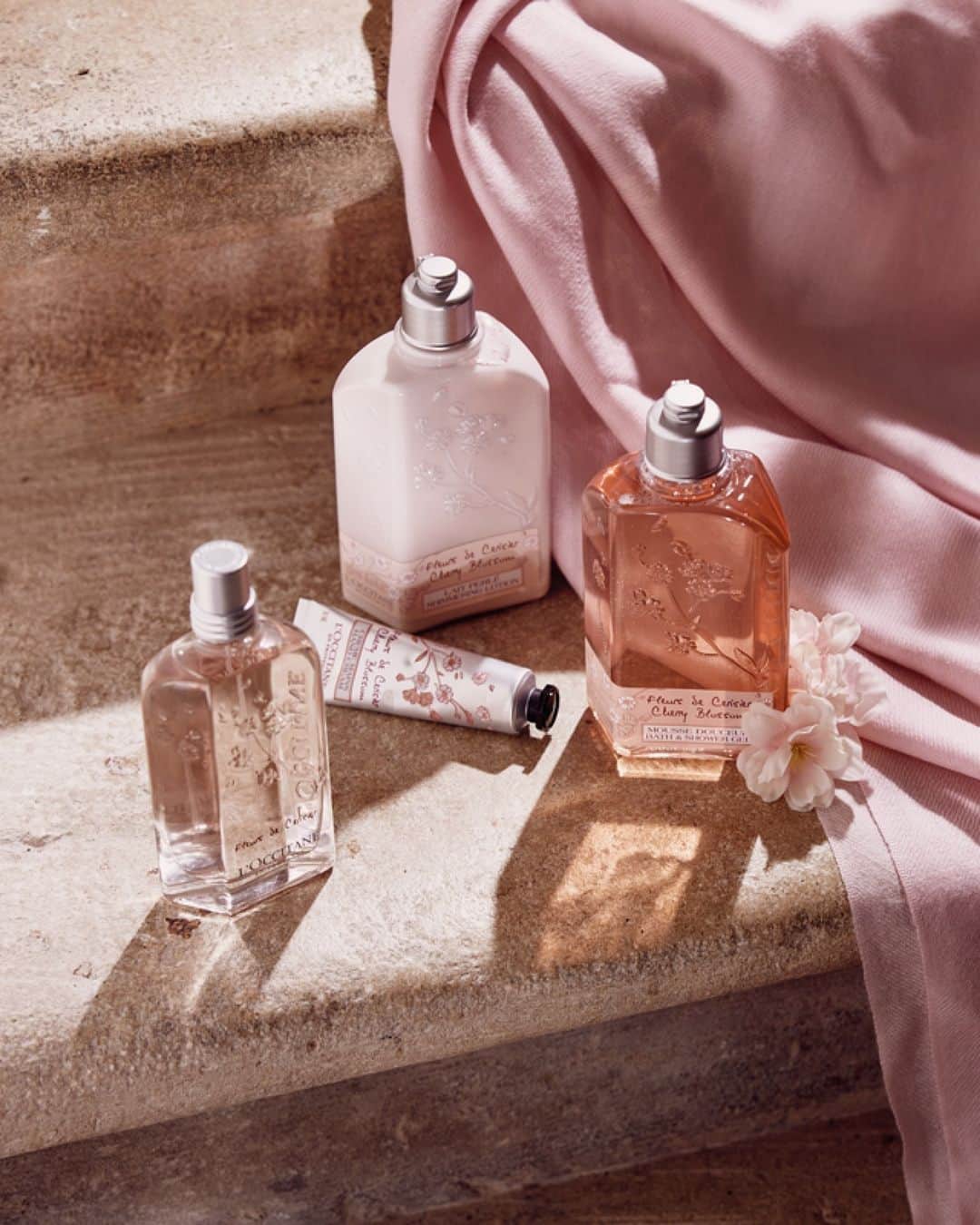 ロクシタンのインスタグラム：「Our Cherry Blossom’s distinctive parallelepiped bottle shape is a poetic evocation of the wind sweeping through cherry trees in bloom 🍃🌸 ⁣ ⁣ #CultivatorsOfCraft #ArtOfScent ⁣」