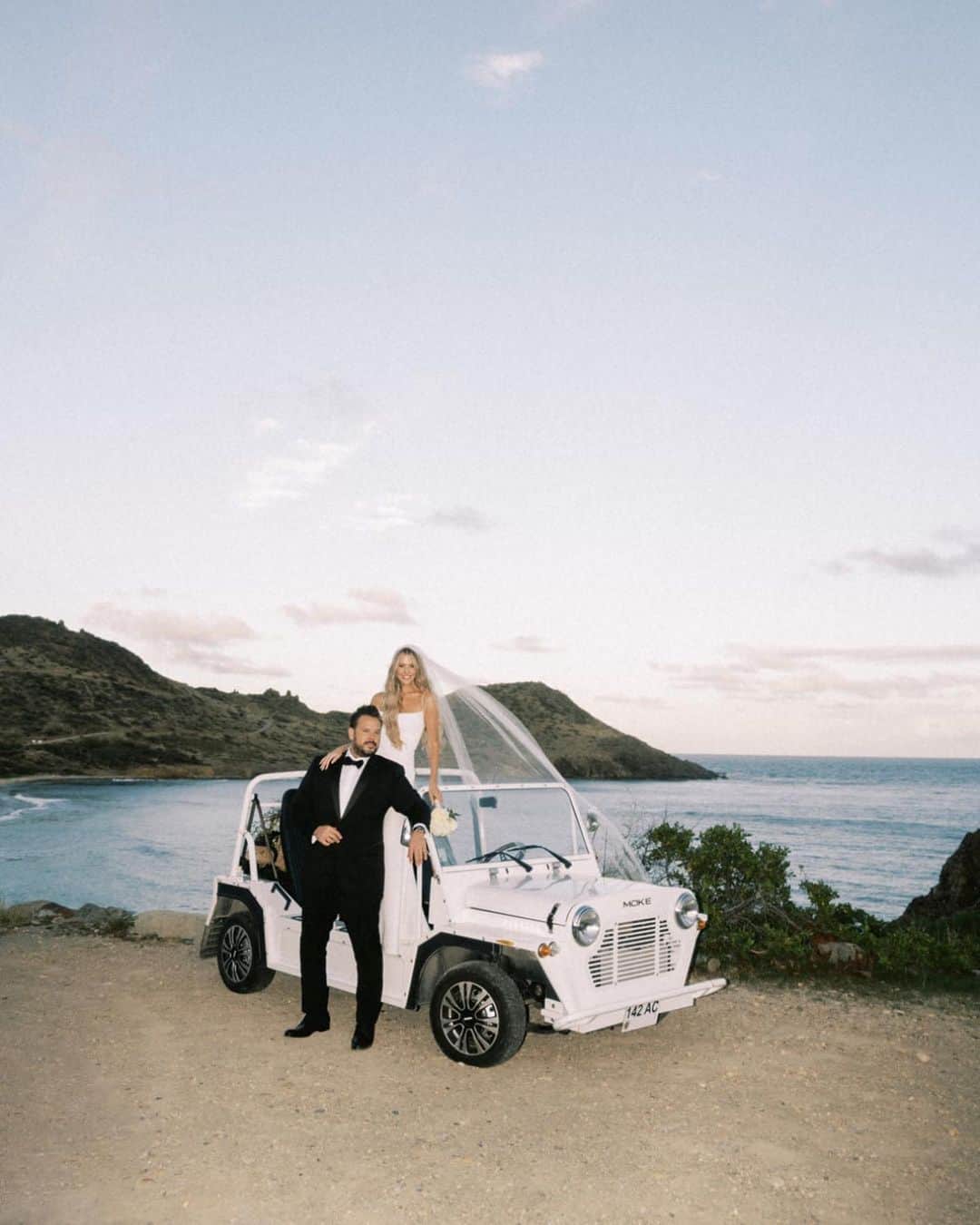 Ceci Johnsonさんのインスタグラム写真 - (Ceci JohnsonInstagram)「Forever looks good on these two. 🤍  Swipe for more details of their lush island wedding in St.Barths, as seen in @TheKnot. ✨  Invitation Design & Event Branding: @cecinewyork Planner: @epicpresentations Event Designer: @epicpresentations 📸 & 🎥: @thebrothersmartens Ceremony & Reception Site: @nikkibeachsaintbarth Florist: @b_floralevents Officiants: Tori Bradburry & Josh Sepkowitz Wedding Dress: @alexperryofficial Reception & After-Party Dresses: @berta via @bblewisville Veil: @bblewisville Suits: @balanicustom Engagement & Wedding Rings: @diamondsdirect Hair and Makeup: @matwulff Wedding Party Attire: @alexperryofficial, @balanicustom Rental Equipment: @nikkibeachsaintbarth Catering: @nikkibeachsaintbarth Cake: @chokolavany.stbarth Entertainment: @nikkibeachsaintbarth, @blackrabbitprojects Welcome Bags: @epicpresentations Transportation: @coolrental  #couturedesign #luxurydesign #luxurystationerydesign #luxuryweddingstationery #luxurysignagedesign #eventbranding #cecicouture #weddingprograms #ceciwedding #placecards #stbarth」4月24日 23時31分 - cecinewyork