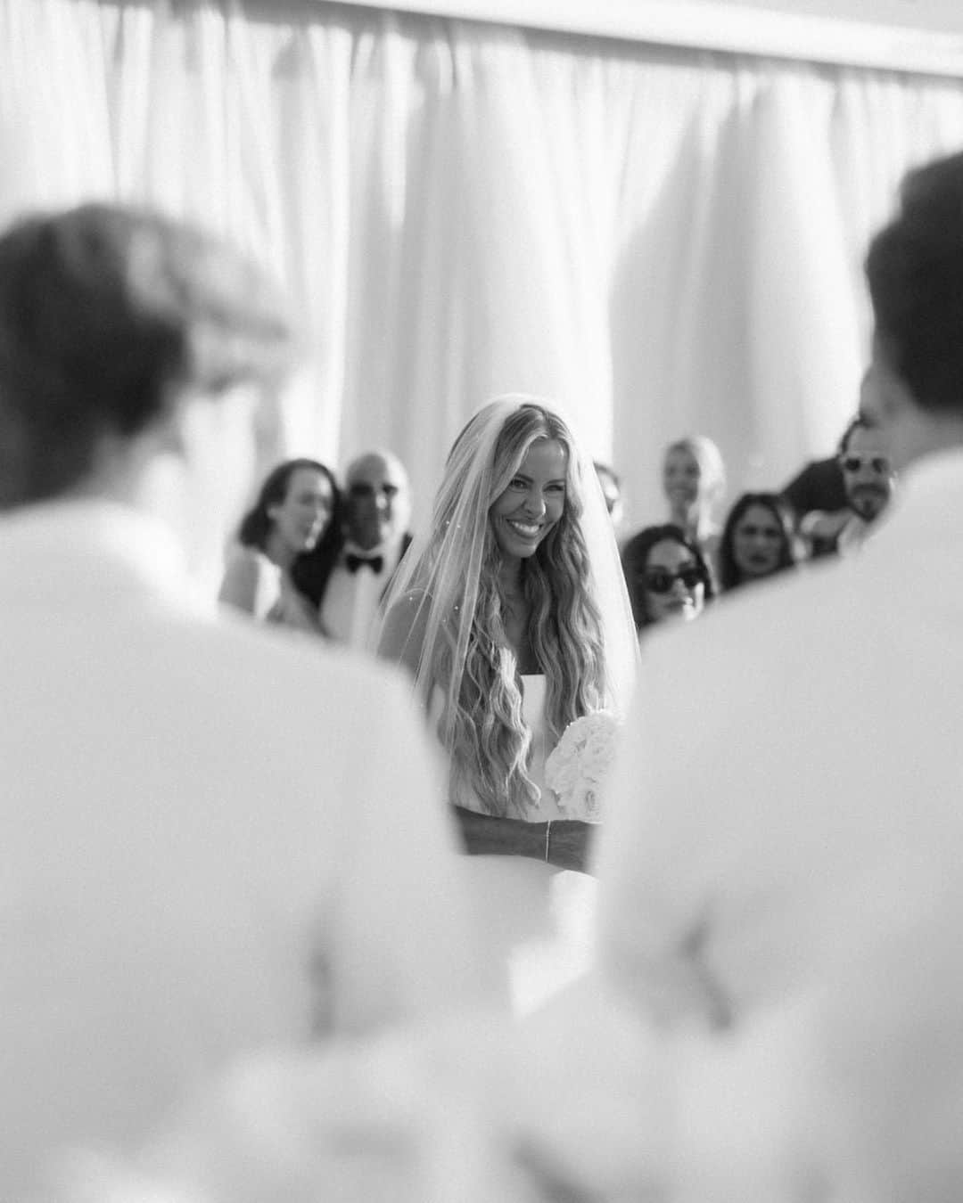 Ceci Johnsonさんのインスタグラム写真 - (Ceci JohnsonInstagram)「Forever looks good on these two. 🤍  Swipe for more details of their lush island wedding in St.Barths, as seen in @TheKnot. ✨  Invitation Design & Event Branding: @cecinewyork Planner: @epicpresentations Event Designer: @epicpresentations 📸 & 🎥: @thebrothersmartens Ceremony & Reception Site: @nikkibeachsaintbarth Florist: @b_floralevents Officiants: Tori Bradburry & Josh Sepkowitz Wedding Dress: @alexperryofficial Reception & After-Party Dresses: @berta via @bblewisville Veil: @bblewisville Suits: @balanicustom Engagement & Wedding Rings: @diamondsdirect Hair and Makeup: @matwulff Wedding Party Attire: @alexperryofficial, @balanicustom Rental Equipment: @nikkibeachsaintbarth Catering: @nikkibeachsaintbarth Cake: @chokolavany.stbarth Entertainment: @nikkibeachsaintbarth, @blackrabbitprojects Welcome Bags: @epicpresentations Transportation: @coolrental  #couturedesign #luxurydesign #luxurystationerydesign #luxuryweddingstationery #luxurysignagedesign #eventbranding #cecicouture #weddingprograms #ceciwedding #placecards #stbarth」4月24日 23時31分 - cecinewyork