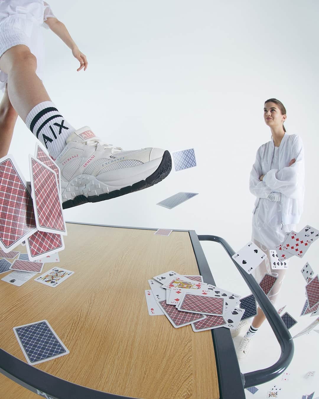 のインスタグラム：「Play the cards you hold well⁣ ⁣ Discover A|X Armani Exchange sneakers collection #AXSS23⁣ ⁣ Photo @mescondi」