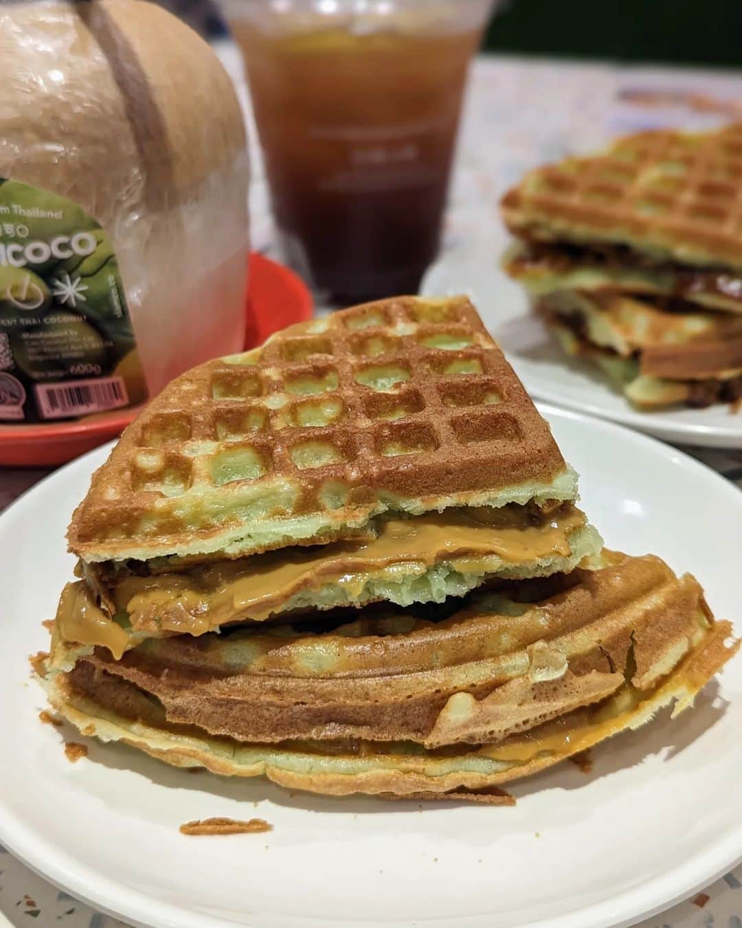 Li Tian の雑貨屋のインスタグラム：「Some impressive crispy waffles served @thehainanstory 😎The housemade hainanese kaya used in the peanut butter + kaya waffle is a notch above the rest with its aromatic caramelized notes that aren't sugary sweet.   As for the rojak jam waffles, it's one of its kind which u love or not depending on whether u are fond of rojak. In any case, dig in when it's hot!   The Hainan Story Coffee House #02-17 NEX  #sgcafe #sgfood #waffles #desserts #sg #peanutbutter #rojak #fusion #desserts #sgsnacks #snacks #kopi #coffee #sgfoodie」