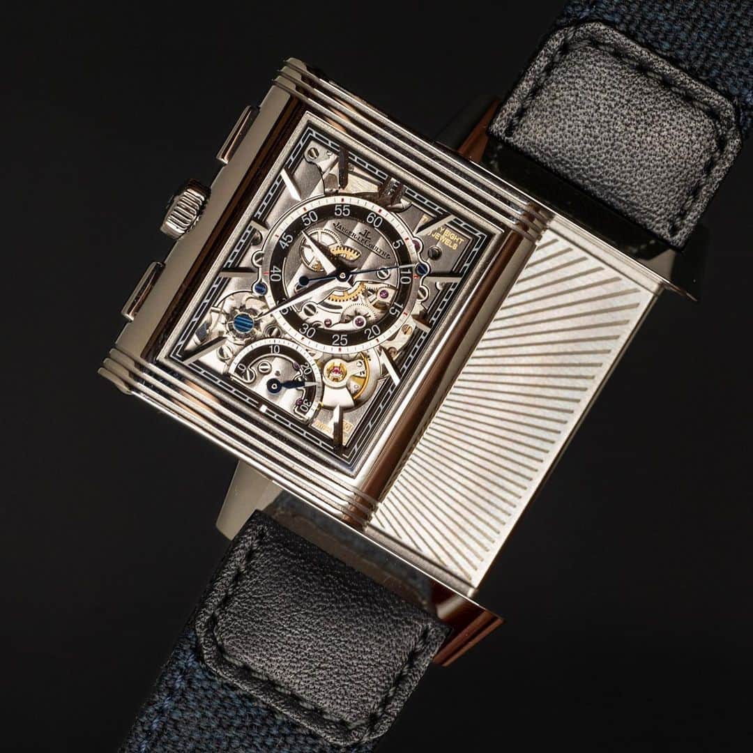 のインスタグラム：「The impressive open-worked reverse of the @jaegerlecoultre Reverso Tribute Chronograph. It gives a view on the fascinating mechanism of the retrograde chronograph. The leather and blue canvas strap by Fagliano makes this icon very up-to-date for the 2020’s.. #jaegerlecoultre #reversotribute」
