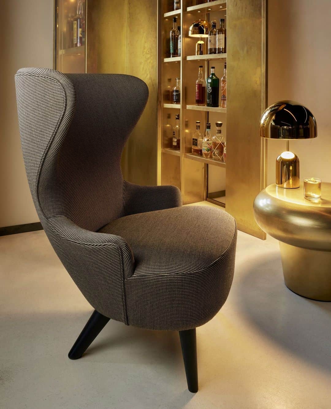 トム ディクソンのインスタグラム：「The original idea behind WINGBACK was to design 6 contemporary mismatching archetypical club chairs, full size silhouettes were sketched on oversize bits of wallpaper and cardboard maquettes cobbled up with glue guns before being prototyped by master upholsterer George Smith. The Wingback was the clear winner and made its debut in 2007, remastered for maximum comfort and engineered efficiency.⁠ ⁠ In 2015, the range was re-engineered and refined to give it an even more rakish silhouette, the ergonomics adjusted for more comfort and the manufacturing process modernised and moved to Europe; a metal frame, moulded hard foam, pocket sprung seat. A dining chair is added to the collection.⁠ ⁠ Now available in 265 @KvadratTextiles fabrics  @designresearchstudio⁠ @peer_lindgreen @silverleaf_bar」