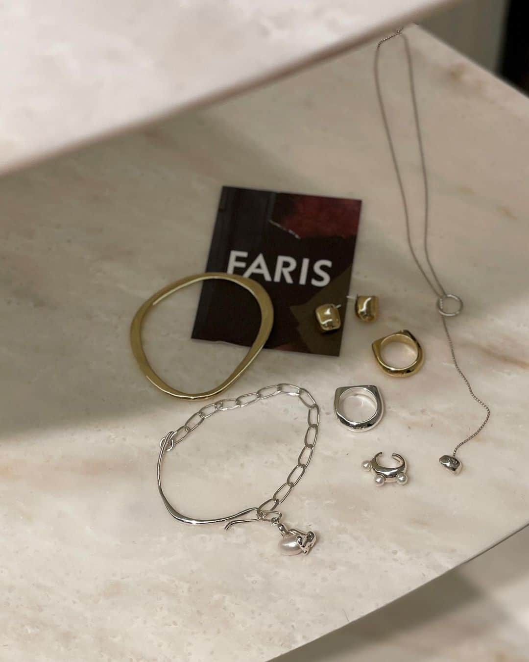 ETRÉ TOKYO ストアさんのインスタグラム写真 - (ETRÉ TOKYO ストアInstagram)「@etretokyo  【4/28 New Arrival】 @farisjewelry  ㅤㅤ ㅤㅤㅤ ㅤㅤㅤ  FARIS TRESOR Bracelet SILVER Free size ¥52,800(tax in) ㅤㅤㅤ ㅤㅤㅤ ㅤㅤㅤ FARIS BLANCO Ring SILVER / GOLD Free size ¥38,500(tax in) ㅤㅤㅤ ㅤㅤㅤ ㅤㅤㅤ FARIS AERO Bangle GOLD Free size ¥38,500(tax in)  ㅤㅤㅤ  FARIS PEAK Ring GOLD Free size ¥38,500(tax in) ㅤㅤㅤ ㅤㅤㅤ ㅤㅤㅤ FARIS LURO Necklaceㅤㅤㅤ SILVER Free size ¥30,800(tax in) ㅤㅤㅤ ㅤㅤㅤ  FARIS CHUB Hoops GOLD Free size ¥28,600(tax in)  ㅤㅤㅤ ㅤㅤㅤ FARIS GROSSO Perla Ear Cuff SILVER Free size ¥27,500(tax in)  ㅤㅤㅤ  - - - - - - - - - - - - - - - - - - - - - - - - - - - -  商品詳細はTOPページURLよりチェック🔍 ›› @etretokyo_store  ㅤㅤㅤ スタッフコーディネートも毎日更新中【 #etretokyo_staff_ootd 】をフォロー🐿️  TOPページの"フォロー中"から 気になるスタッフのアカウントをフォロー🤝  - - - - - - - - - - - - - - - - - - - - - - - - - - - -  ㅤㅤㅤ ⁡  ㅤㅤㅤ 【INFORMATION】 ⁡ ⁡ ※ 4/27(木)発売のアイテムは 4/28(金)12:00よりお在庫のある場合、ルミネカード会員様限定で店舗通販のご利用が可能です。 ⁡ ※お電話がつながりにくい可能性がございます。 ⁡ ※また混雑時には入場制限及び 試着点数の制限を設けさせて頂きます。 予めご了承ください。 ⁡ ⁡ ご理解、ご協力を賜りますよう 心よりお願い申し上げます。 ⁡ ⁡  ㅤㅤㅤ ㅤㅤㅤ 【LUMINE SHINJUKU STORE】 ETRÉ TOKYO ルミネ新宿2店 TEL：03-5989-0979 ー営業時間ー (平日、土日祝)11:00-21:00  ⁡ #etretokyo#etre#fashion#etretokyoshinjuku #2023etre#etretokyo_staff_ootd#2023ss #新作紹介#ルミネ新宿2#シルバーアクセ#ゴールドアクセ#ブレスレット#ゴールドリング#シルバーリング#イヤーカフ#アクセサリー#faris#farisjewelry#ファリス」4月26日 11時05分 - etretokyo_store