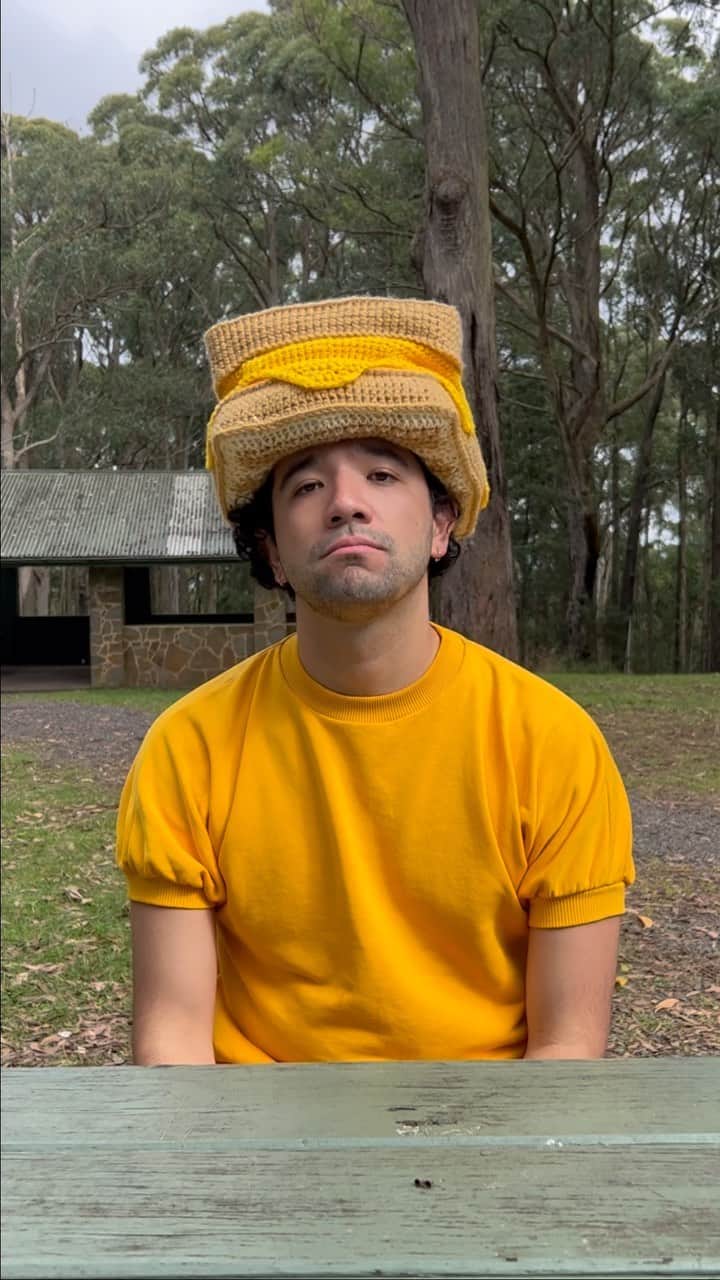 Phil Fergusonのインスタグラム：「When you say you’ll bring the sandwiches to the picnic. 🥪  What do you usually put in yours grilled cheese toastie? I usually do cheese (obvs), tomato, spinach, onion, capsicum and mayo. Always turns out pretty yummy!  So cute to make a little toastie/grilled cheese hat FINALLY. I made this from yarn I got from Savers so I might make a reel about it but either way, I’m slowly getting back into the spirit again!  Hope everyone’s been well!  (Also thank you @maryanneoketch for taking the video of me at the park lol)  #crochet #food #hat #toasties #grilledcheese #cold #melbourne」
