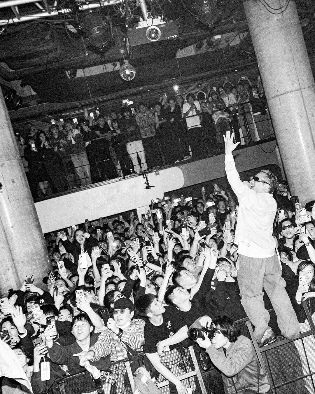 東京DANDYのインスタグラム：「‘TRAVELLING WITHOUT MOVING’. I had to move a lot to take photos that night. O’East is a huge space. I found my self loitering around familiar faces in the relative sanctuary of the DUO Exchange. Some photos from Tokyodandy.com」
