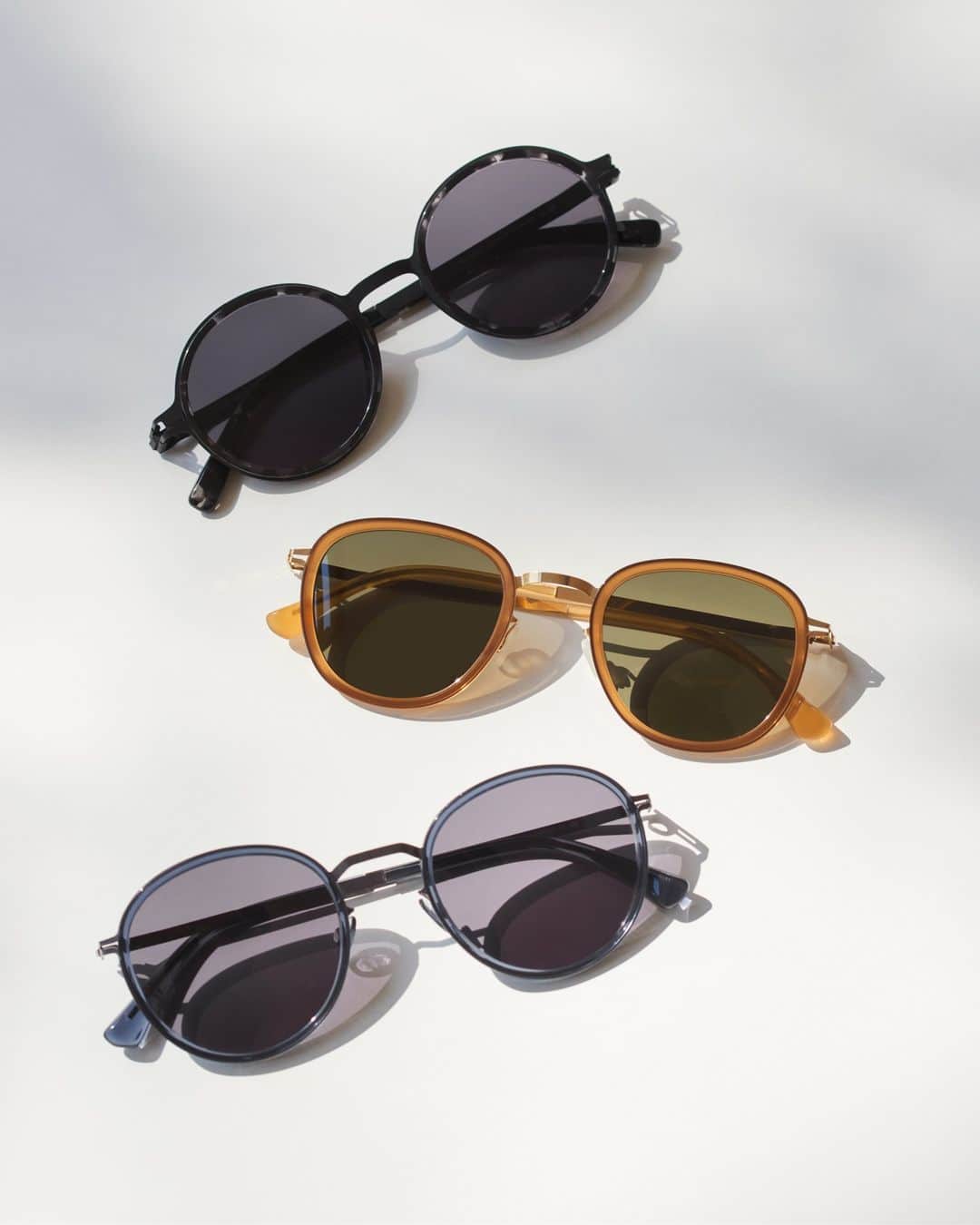 MYKITAのインスタグラム：「Effortless sunglass style – iconic shapes and colours that always look good.  From top to bottom: DAYO, HELMI and TUVA – discover more styles for sunny days via link in bio」