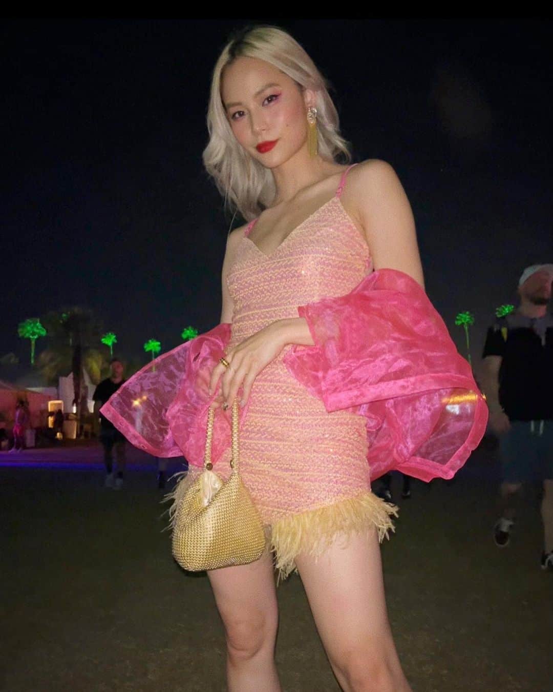 Yukiのインスタグラム：「Even though my phone got stolen and there was a whole lot of miscommunications, I had fun 💕   Special thanks to the ones I spent time with during Coachella Weekend 2 ☺️ The artist pass and after parties were so fun🙏🏼🥲 I felt so spoiled, thank you ♥️  Wearing : @matildecouture dress, pink blouse by @santegrace, earrings by @frjewels @pr_solo   #coachella #coachellaweekend2 #coachellaoutfit」