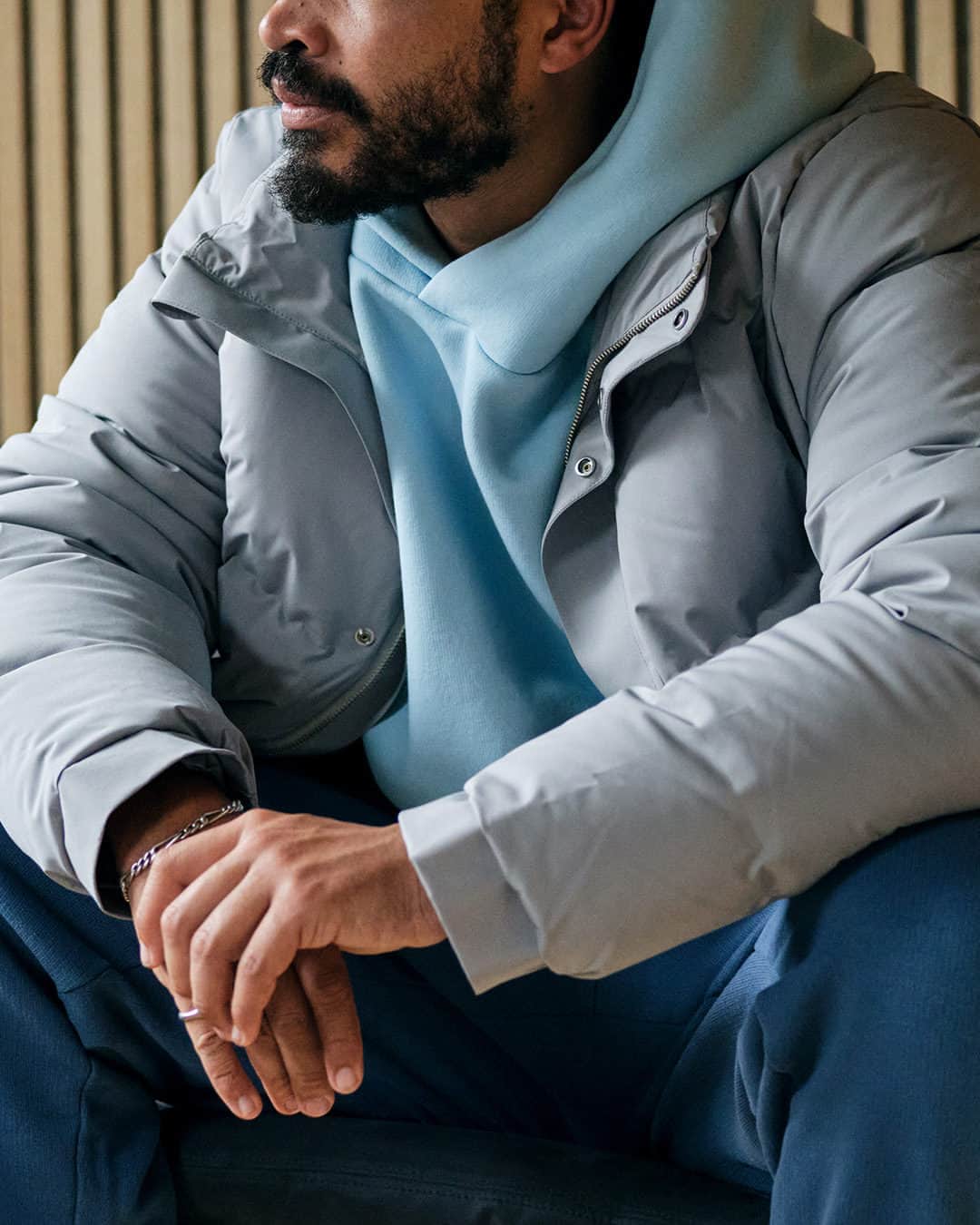 MR PORTERのインスタグラム：「When the April sunshine fades and ominous-looking clouds loom overhead, you can rely on @nn07.official’s quilted down jacket to have your back. Its wind and water-resistant shell makes it much more reliable than the weather it’s designed to protect you from.  Tap to shop and head to the bio to discover the foundational pieces to invest in.」