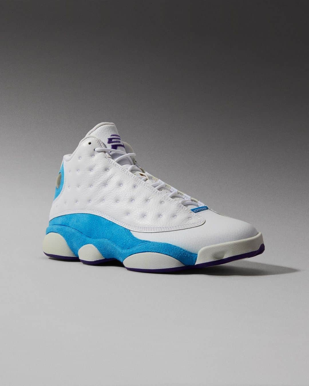 Flight Clubのインスタグラム：「The Air Jordan 13 Retro 'CP3' recalls a player-exclusive sported by point guard Chris Paul during his rookie season in Charlotte. In step with the Hornets' home team jerseys, the white colorway dons a tumbled leather upper with Orion Blue hits and purple 'CP' branding on the tongue.」