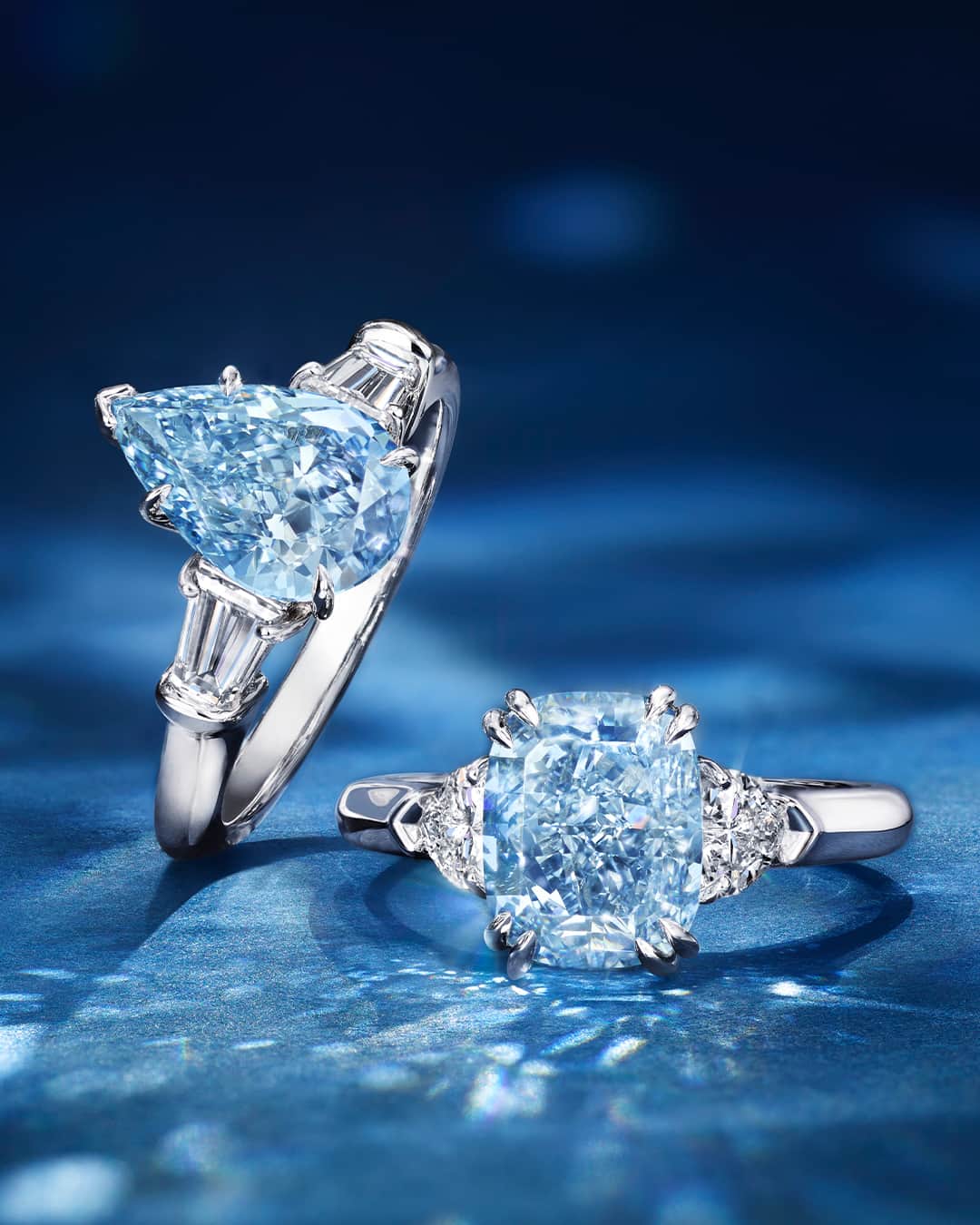 ハリー・ウィンストンのインスタグラム：「These one-of-a-kind Classic Winston Pear-Shaped and Cushion-Cut Blue Diamond Ring are a testament to our longstanding commitment to the most exceptional gems in the world. Tap the link in bio to explore the Hope Collection. #HighJewelry #HarryWinston」