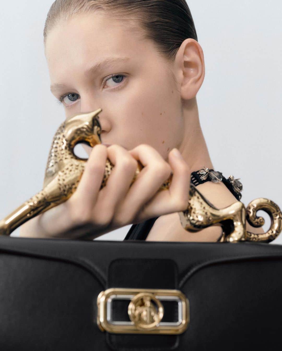 ランバンのインスタグラム：「Inspired by the Art Deco ironwork of Armand-Albert Rateau, the Lanvin Pencil Cat's sculpted hardware is emblematic of the house's enduring style.   #LANVIN」