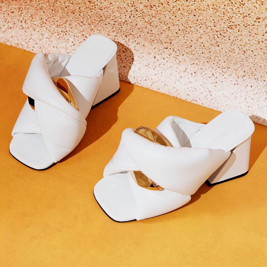 Saks Fifth Avenueのインスタグラム：「Make bride strides by completing your wedding weekend looks with bold mules from @jw_anderson. Tap or head to the link in our bio to shop. #Saks」