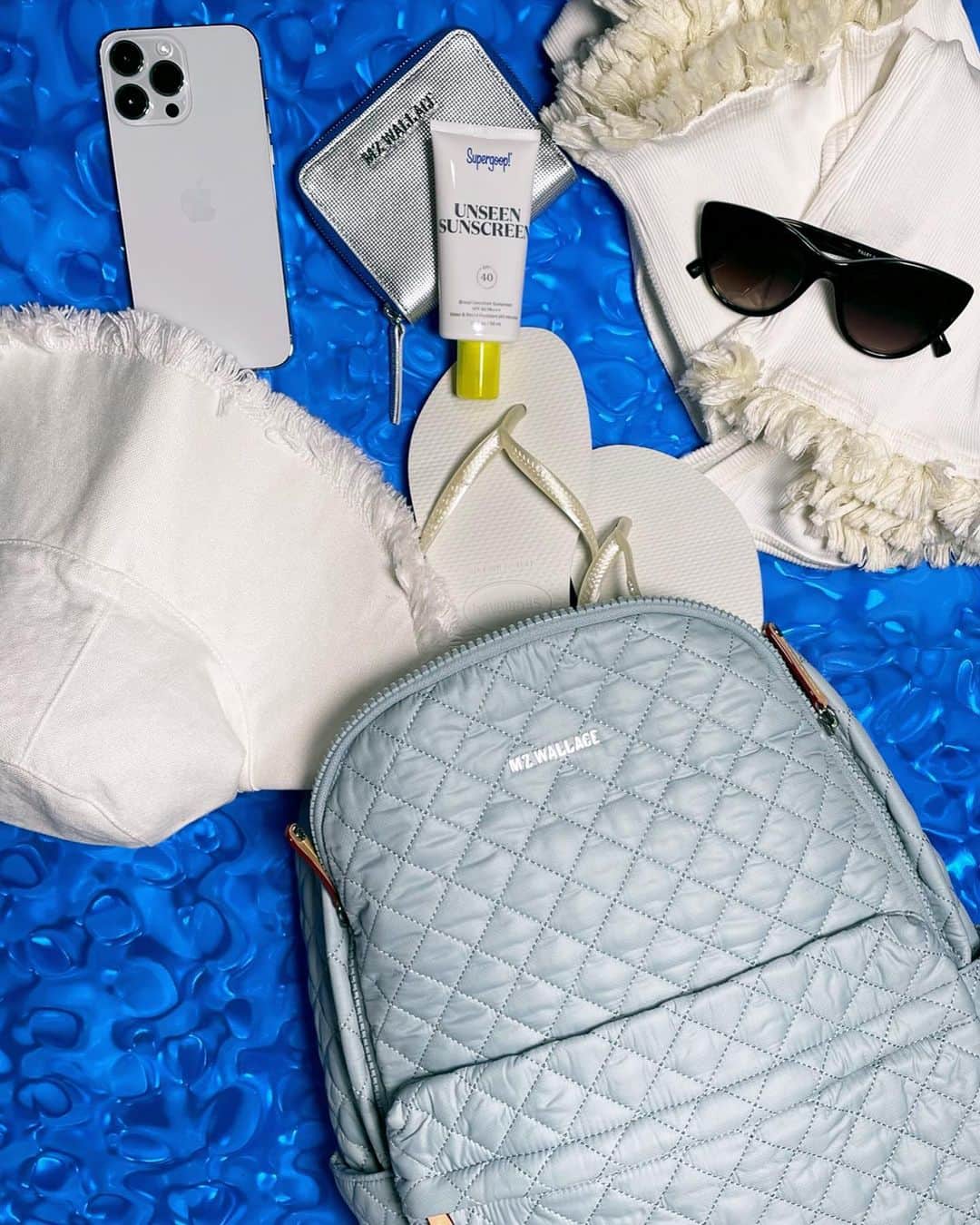MZウォレスのインスタグラム：「We're spilling it: here's everything you can fit for a day in the sun in our Metro Backpack.」