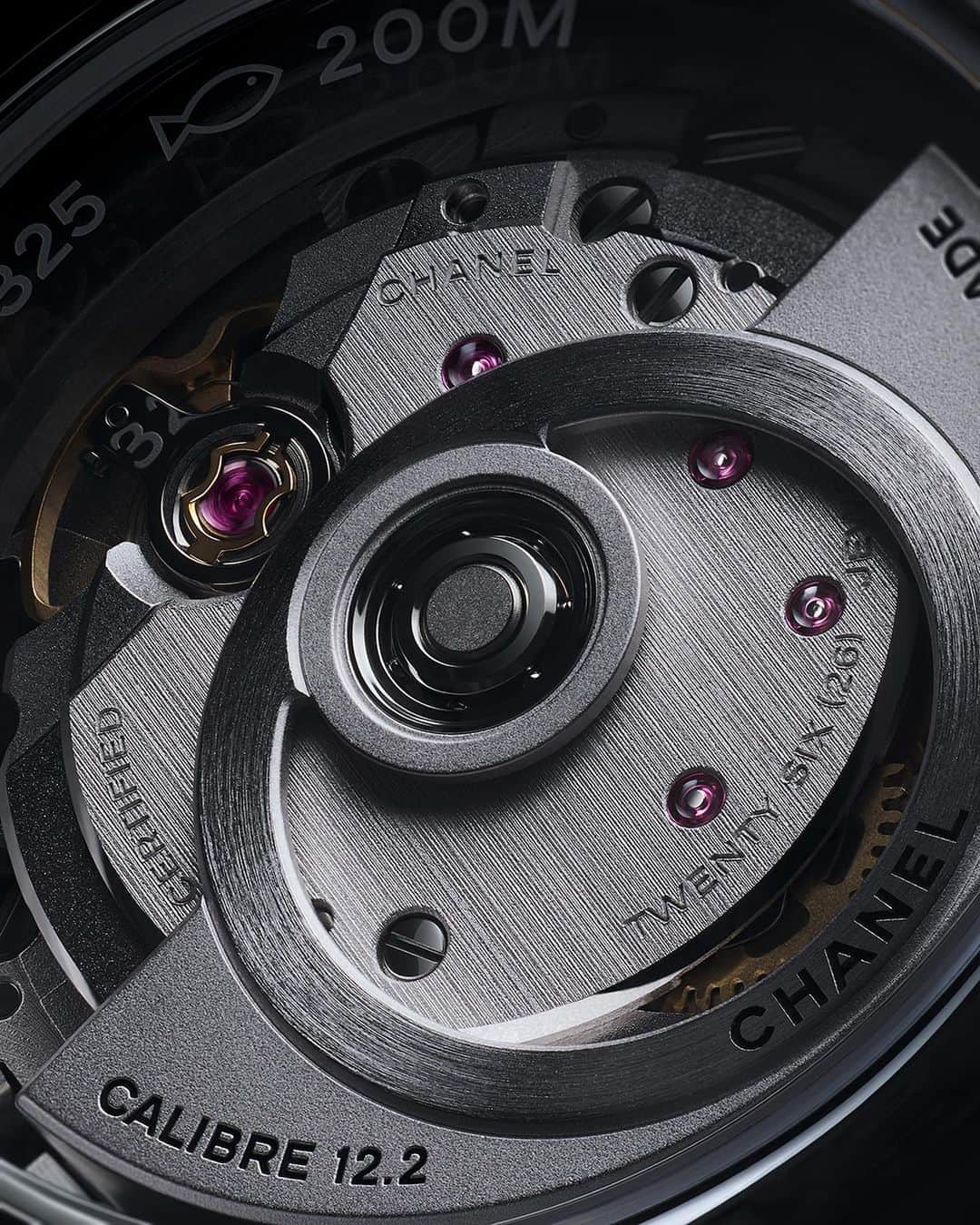 のインスタグラム：「J12. Allure on the inside that shows on the outside. On the front, the white ceramic indicators elegantly contrast with the black-lacquer dial. Visible through a sapphire crystal caseback, the Caliber 12.2 movement powers this watch, which was produced and assembled at the CHANEL Manufacture in Switzerland.  Discover on chanel.com. Link in bio  #J12 #CHANELWatches #ItsAllAboutSeconds」