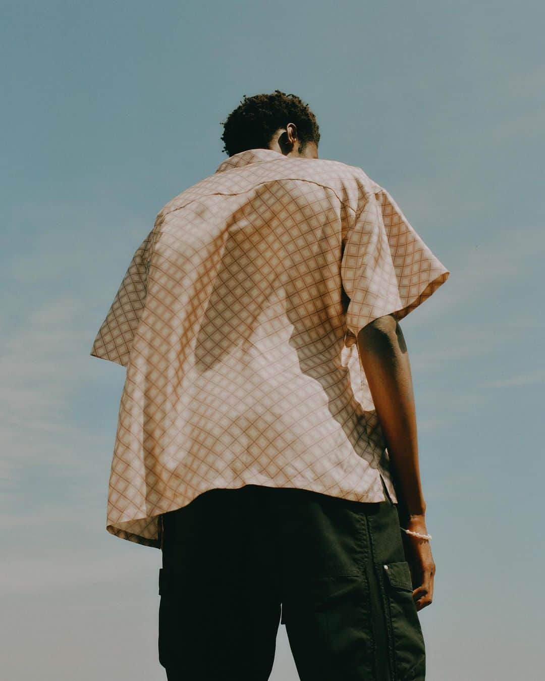 ジョン エリオットのインスタグラム：「The first drop from "Leap of Faith" Delivery 2 is highlighted by new 100% silk styles. Designed for high summer in Paris, shirting comes in a new hybrid fit that merges Camp and Cloak silhouettes. Shorts have classic cropped styling. Link in bio and stories.」