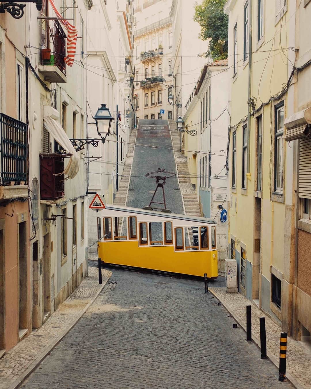 AnOther Magazineさんのインスタグラム写真 - (AnOther MagazineInstagram)「From the colourful temples of India to the art nouveau grandeur of Romania, Wes Anderson can draw out the magic of any location. On the day following the auteur's birthday, we're taking a look back at Wally Koval's book which pays tribute to the director’s dream-like aesthetics 💌⁠ ⁠ The book by Koval (who is the person behind the account @accidentallywesanderson) contains 200 of the best shots from the much-adored Instagram page, whittled down from over 15,000 global submissions. Find out more at the link in bio 📲⁠ ⁠ 📸 1. HOTEL OPERA Prague, Czech Republic c. 1891. Photo by @valentina_jacks⁠ 2. ASCENSOR DA BICA Lisbon, Portugal c. 1892. Photo by #JackSpicerAdams⁠ 3. CENTRAL FIRE STATION Marfa, Texas c. 1938. Photo by @emprestridge⁠ 4. WHARF SHED Glenorchy, New Zealand c. 1885. Photo by @friiidaberg⁠ 5. CABLE CAR Cologne, Germany c. 1957. Photo by #OliverStolzenberg」5月2日 20時03分 - anothermagazine
