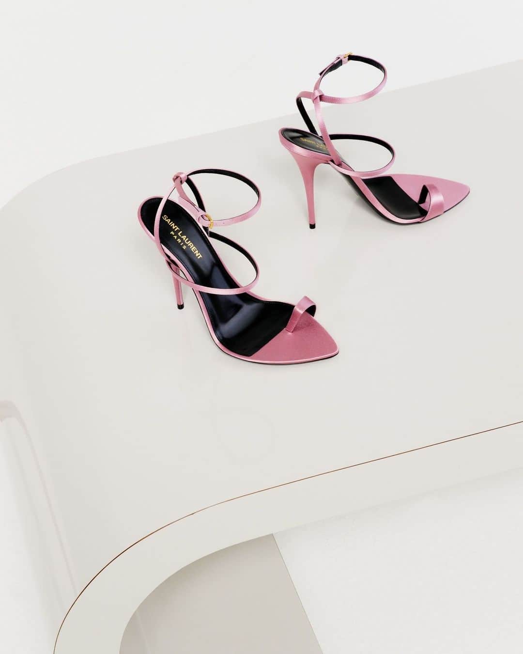 barneysnyofficialのインスタグラム：「Pointed-toe @Ysl sandals featuring a buckle strap at the ankle, a strap around the toe and a covered stiletto heel.」