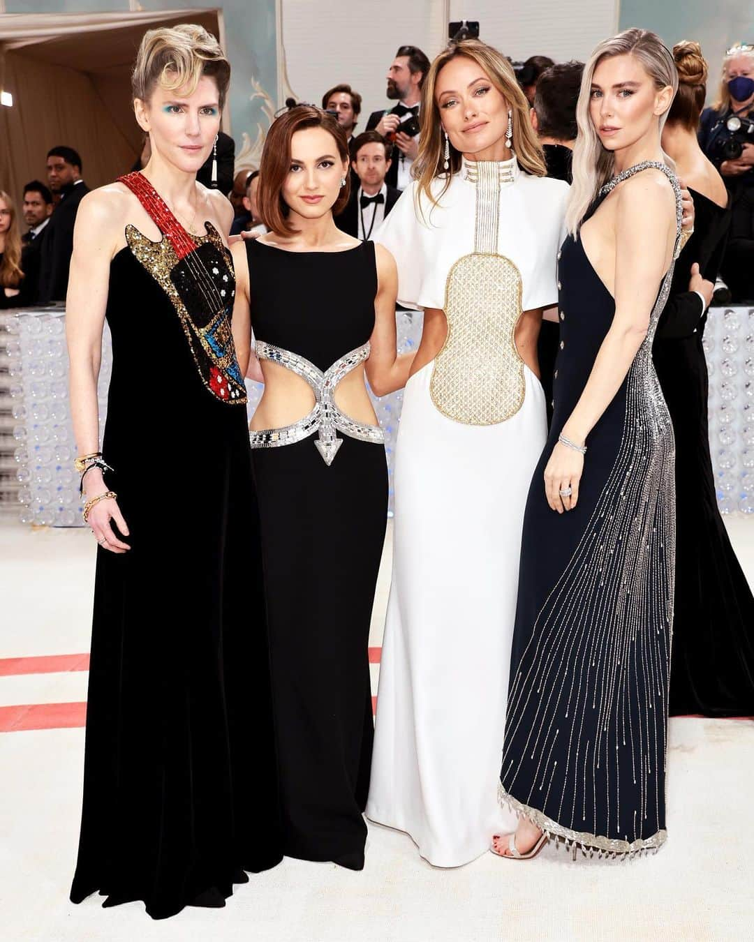 Chloéさんのインスタグラム写真 - (ChloéInstagram)「Chloé Creative Director @GabrielaHearst attended the 2023 Met Gala with guests @oliviawilde, @maudeapatow and @vanessa__kirby.   Gabriela Hearst wore a black deadstock velvet bustier column dress with a scooped back and embroideries of deadstock multicoloured sequins and strass and tubular beads forming an image of an electric guitar.   The event christened the landmark @metcostumeinstitute exhibition ‘Karl Lagerfeld: A Line of Beauty’ and, in honour of the occasion, Gabriela, Olivia and Maude wore bespoke Chloé gowns inspired, respectively, by the ‘Aurelien’ and ‘Angkor’ dresses and a shirt dress Karl Lagerfeld created for the Maison in the 1980s – all reimagined in deadstock materials. Vanessa meanwhile wore the original ‘Brise’ dress from the Autumn-Winter 1983-84 collection. ​ You can now see the original versions of these Chloé designs on display at the retrospective, each communicates in its own unique way Lagerfeld’s couture savoir-faire and his aptitude for combining a panoply of references, from classical design to surrealism.​ ​ #ALineOfBeauty #MetKarlLagerfeld #CostumeInstitute #MetGala ​#ChloeArchive」5月3日 0時06分 - chloe