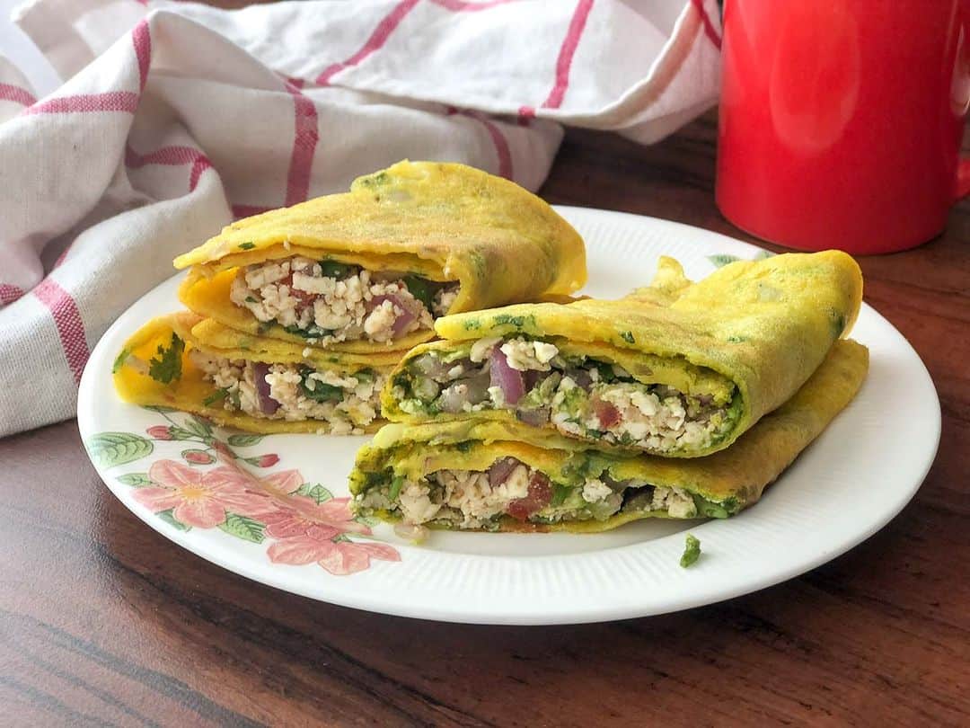 Archana's Kitchenさんのインスタグラム写真 - (Archana's KitchenInstagram)「Here is an easy breakfast idea. Try this High Protein Moong Dal Cheela Recipe where I have stuffed the Cheela with crumbled Paneer making it great for breakfast, lunch box, or even for a quick dinner. Do try this recipe and tell me how you liked it :)  Ingredients for the batter 1 cup Yellow Moong Dal 1/2 cup White Urad Dal 1 inch Ginger 2 Green Chillies Salt, to taste 1 teaspoon Cumin seeds  1/2 teaspoon Turmeric powder Coriander Leaves, finely chopped Ingredients for the Filling  1 cup Paneer, Grated 1/2 cup Onion, finely chopped 1/2 cup Tomatoes, finely chopped 1 Green Chilli, finely chopped 1 teaspoon Chaat Masala Powder Salt, to taste Coriander Leaves, finely chopped  👉Soak the moong dal and urad dal together for at least 6 hours/overnight. 👉Grind moong dal along with green chilies and ginger into a smooth batter adding just enough water to grind the dal. The consistency of the batter should be that of a pancake (do not add too much water). 👉Combine all the ingredients for the paneer filling mixture. Keep aside. 👉Heat a skillet and pour a ladle full of moong dal cheela batter in a circular fashion from the center going outwards making a diameter of approximately 6 inch. 👉Drizzle oil/ghee around the spread cheela batter. Allow the moong dal cheela to cook to medium heat. You will notice brown spots appearing inside and around the sides. Let it get crisp and then flip and cook the cheela for about a minute. 👉Remove the moong dal cheela from the skillet, and place it on a platter with the bottom side facing down. Fill about scoop of paneer filling along the center diameter of cheela and fold it lengthwise tightly. Cut the roll diagonally into 2 or three pieces and sprinkle more chaat masala on the top.  Find 1000+ such recipes on our app "Archana's Kitchen" or website www.archanaskitchen.com . . . . . #recipes #breakfast #breakfastideas #breakfasttime #breakfastbowl #breakfastlover #poha #tea #teatime #southindianfood #southindianrecipes #southindianfood #homemadefood #eatfit #cooking #food #healthyrecipes #foodphotography #recipeoftheday #comfortfood #deliciousfood #delicious #instayum #food」5月3日 11時30分 - archanaskitchen