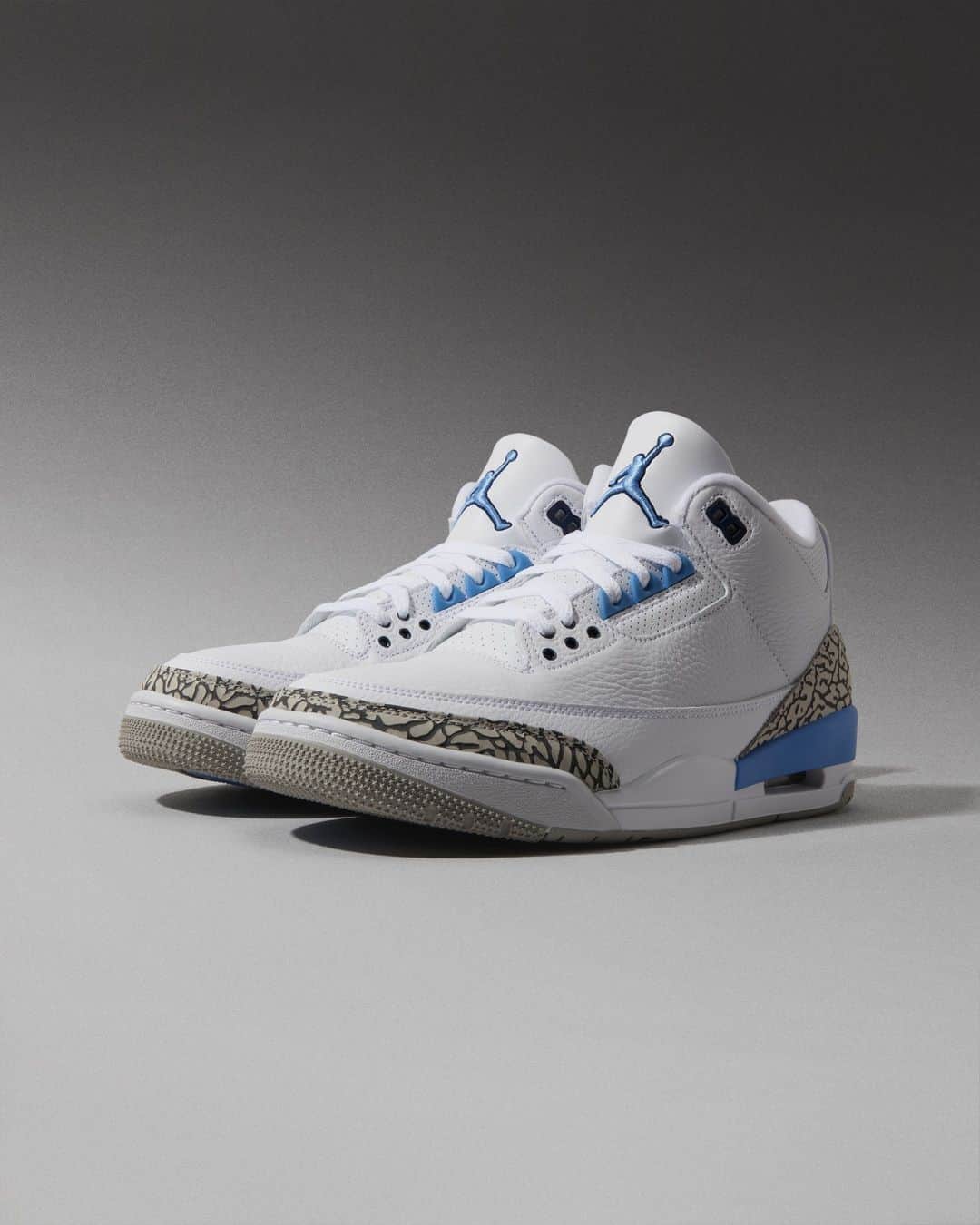 Flight Clubのインスタグラム：「MJ's college days inform the Air Jordan 3 Retro 'UNC,' dressing the silhouette's white leather upper in vibrant Valor Blue hits and signature elephant print overlays.」