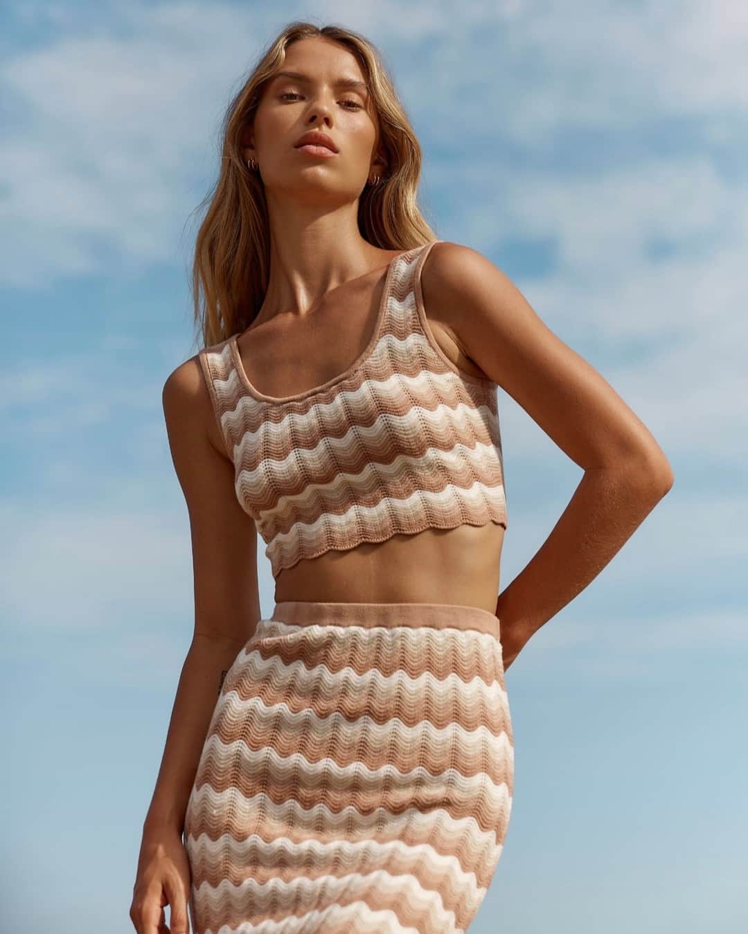 クーカイのインスタグラム：「La brassière courte Beckett ajoutera une touche de féminité et de légèreté à votre look tandis que la jupe longue avec sa taille haute et élastiquée flattera votre silhouette et vous offrira un confort optimal. ✨​​​​​​​​​ - The Beckett  short bra will add a feminine and light touch to your look while the long skirt with its high elasticated waist will flatter your figure and offer optimal comfort. ✨   #kookai #fashion #SS23 #kookaistyle #ootd #outfitinspiration #outfitideas #outfitoftheday #newcollection #spring」
