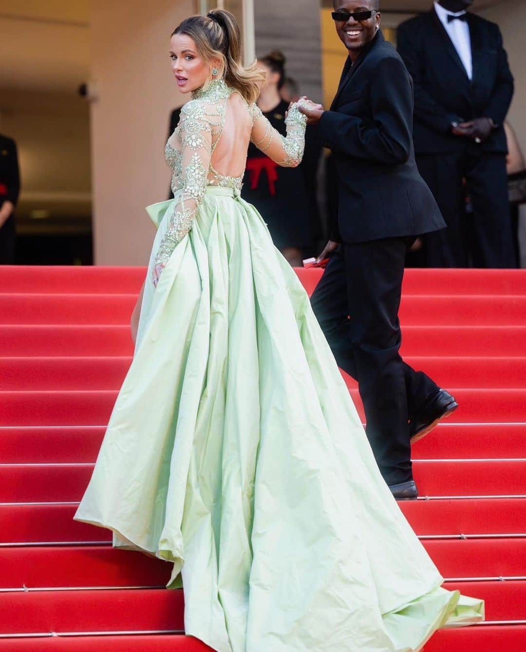 ケイト・ベッキンセイルさんのインスタグラム写真 - (ケイト・ベッキンセイルInstagram)「At the Pot au Feu premiere, 76th Cannes Festival in my dream dress -remembering my first time on these steps 30 years ago in scuffed steel toe capped Dr Martens. Both magical 💚」5月29日 20時54分 - katebeckinsale