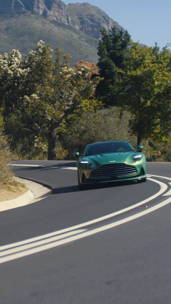 アストンマーチンのインスタグラム：「This is no mere GT. This is purer. Holding you fast in its heart for the ultimate connection between car and driver.  The World’s First Super Tourer.  #AstonMartin #DB12 #ICONDRIVEN」
