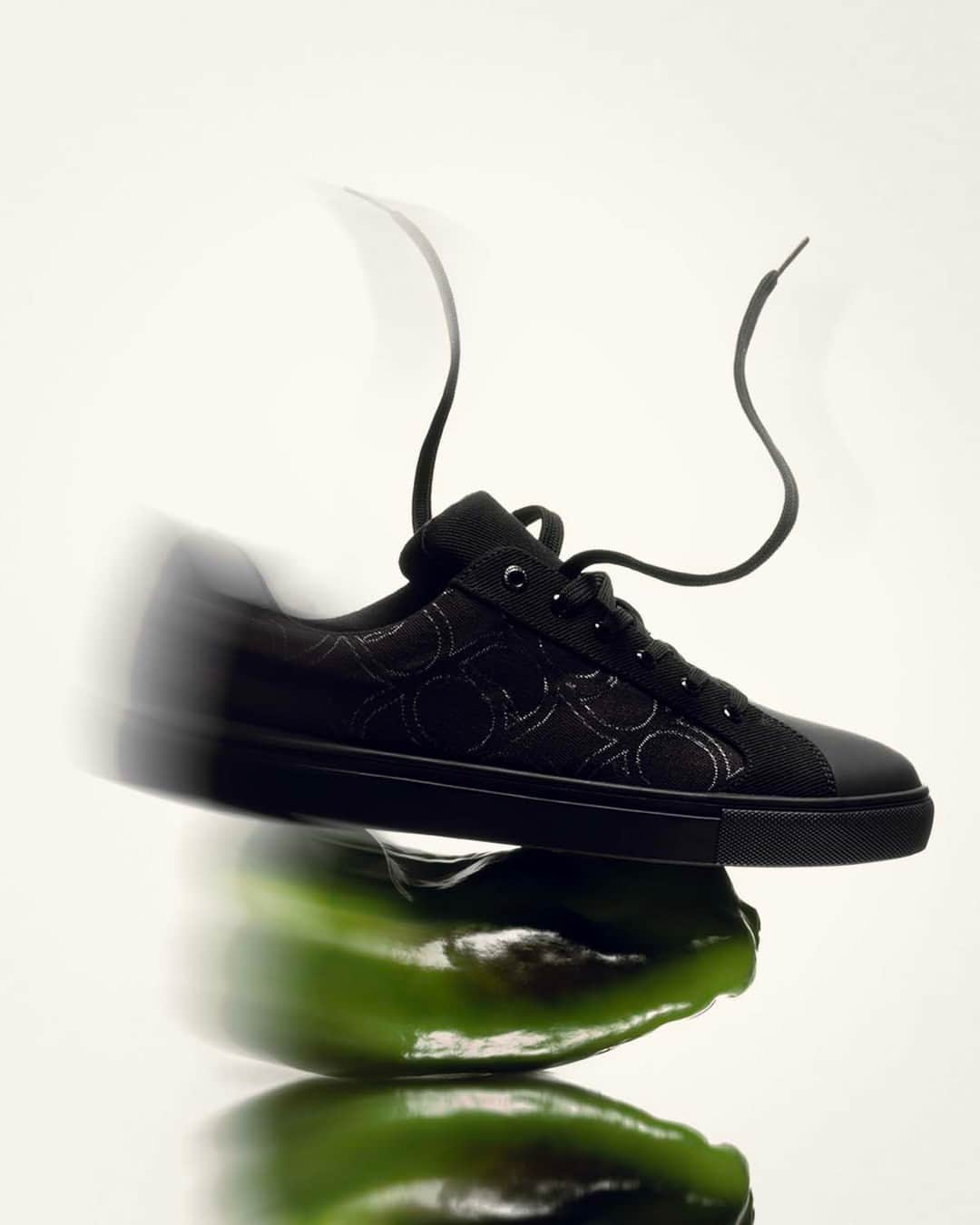 のインスタグラム：「The new Eris sneaker for men and women features the House’s circular greyhound in a subtle all-over monogram print.⁣ Available now in stores.⁣ #TRUSSARDISS23」