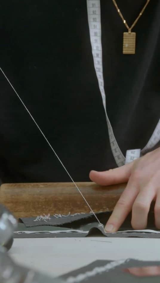 LVMHのインスタグラム：「Discover the art of bespoke tailoring by @Berluti.    Berluti’s Artisans lean into their worktables, surrounded by rolls of fabric and individual suit patterns. This is where they cut, hand-sew and iron in a meditative atmosphere. The result? A unique suit that leaves nothing to chance… or to déjà vu. The perfect kind of suit to wear for film’s premiere during this year’s Cannes Film Festival.  #LVMH #Berluti」