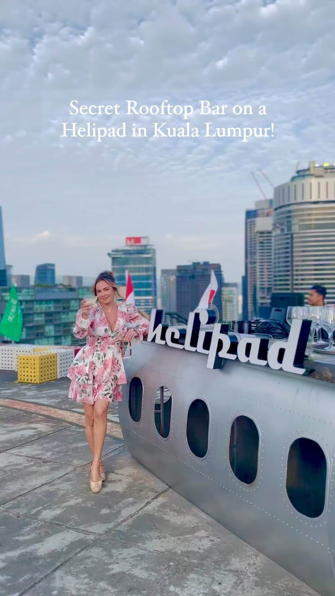 アリサ・ラモスのインスタグラム：「Have you heard of this secret rooftop bar on a helicopter pad in Kuala Lumpur?  Yes my posts are very delayed due to my aggressive travel schedule, but maybe you remember that I decided to stop in Malaysia in between Bangladesh and Japan, and it was amazing!!  I’ve had so many layovers in KL but never actually got out of the airport and explored. Kuala Lumpur is a really cool city with a lot of fabulous things to do, nice restaurants, luxurious yet cheap places to stay, and has several cool adventures to do nearby!  Next time you see a flight w a layover in KL, search multi-city flights and create a longer layover there!  Have you been to Kuala Lumpur?  PS check my Stories highlight for BTS of this bar and more info how to find it!  #kualalumpur #malaysia #helibar #mylifesatravelmovie #longlayover #traveltips #professionaltraveler #globalcitizen #affordabletravel」