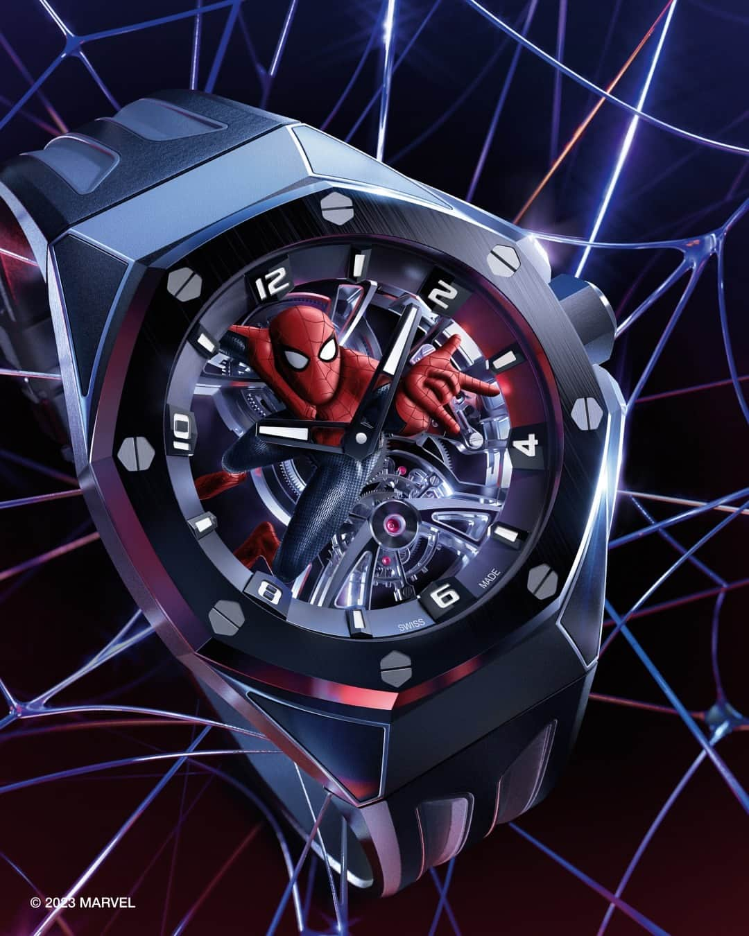 オーデマ・ピゲのインスタグラム：「A time for heroes. At the heart of a 42 mm titanium case contrasted with a black ceramic bezel and a white luminescence that turns blue in the dark, “Spider-Man” stands out from the dizzying openworked movement.  Ref. 26631IO.OO.D002CA.01 #AudemarsPiguet #APxMarvel #RoyalOakConcept」