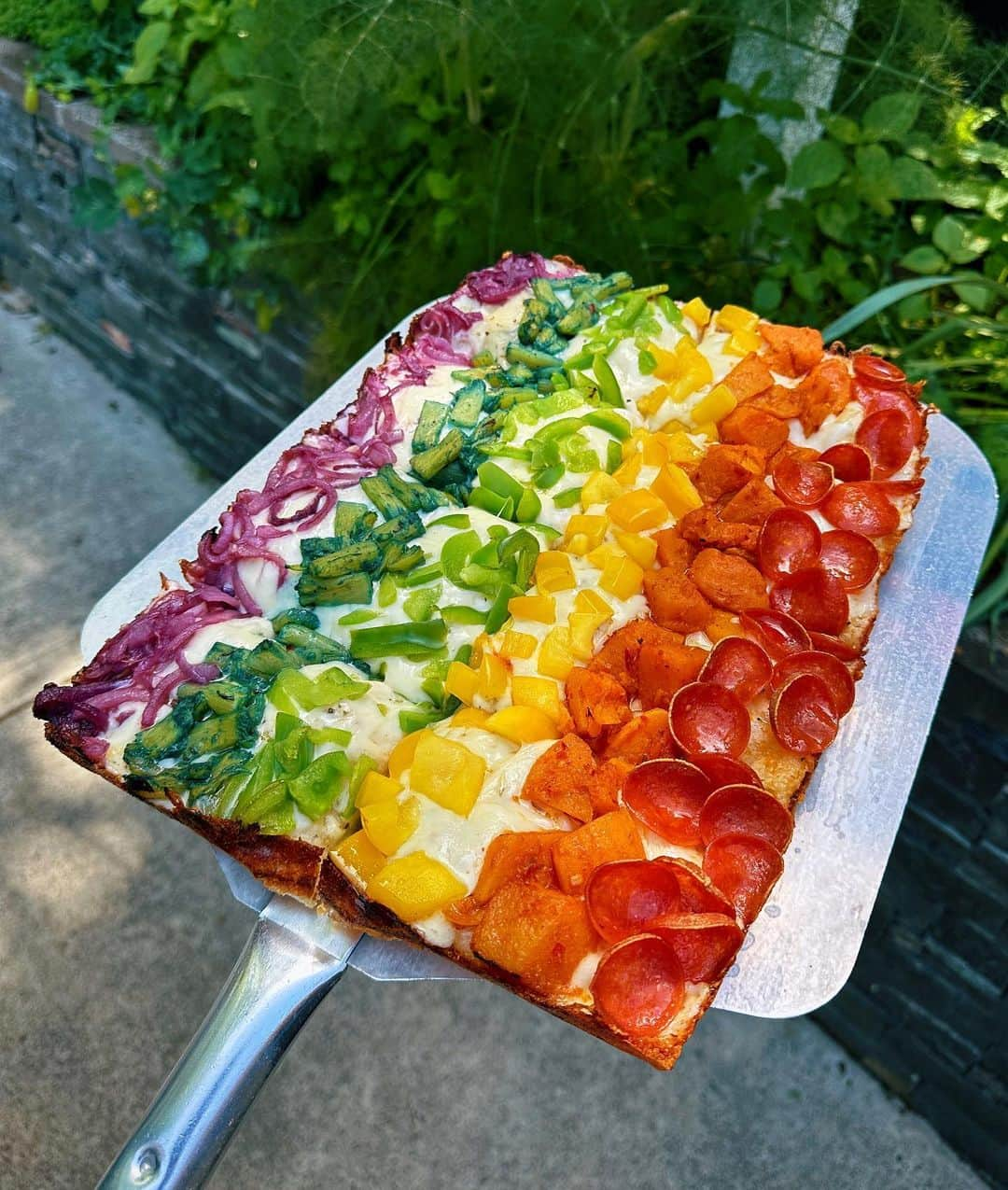 Portlandのインスタグラム：「Happy PRIDE month Portland! 🌈   Local pizza shop @wildchildpizza just released this amazing pie benefiting the @qcenter for the month of June!   Made with delicious ingredients including pepperoni, butternut squash, peppers, Blue Majik pineapple, and purple onions, this pizza tastes as amazing as it looks.  $5 from the purchase of every PRIDE pizza will be donated to the Q Center, which is doing amazing work serving our LGBTQIA+ community in town.  Order for pickup or delivery starting now! Www.wildchild.pizza  #pride #portland #pdx #portlandgear #portlandnw #pride #pridemonth #gaypride」