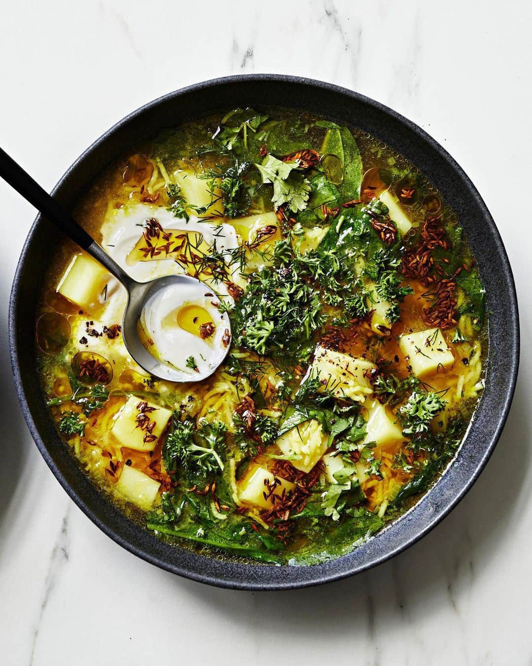 マーサ・スチュワートさんのインスタグラム写真 - (マーサ・スチュワートInstagram)「Inspired by the Persian herbed-rice dish sabzi polo, this turmeric-tinted soup is bursting with spinach, parsley, and dill. Yogurt, a cumin-infused oil, and a squeeze of lemon are the welcome and essential finishing touches to this healthy comforting dish. Get the recipe at the link in our bio. 📷: @conpoulos_photographer recipe: @lucullanfoods food styling: @stevepearcestylist prop styling: @sagecreativeco」5月9日 9時05分 - marthastewart