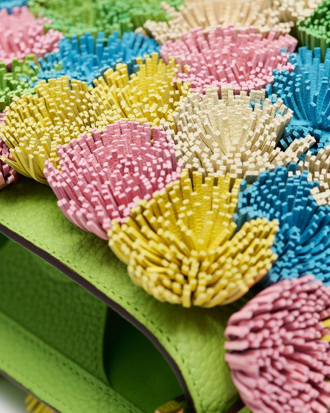 デルボーさんのインスタグラム写真 - (デルボーInstagram)「116 irresistibly colourful pompons adorn the Pin Mini Bucket for that summer feeling.」5月9日 19時30分 - delvaux