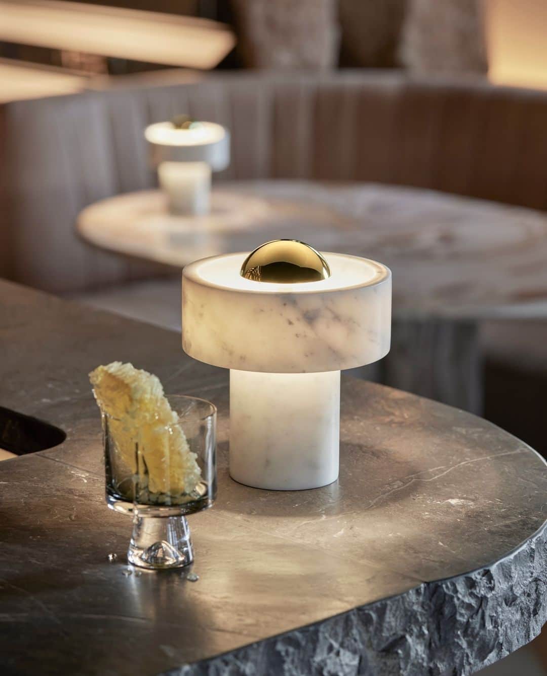 トム ディクソンのインスタグラム：「Our new portable STONE light in solid marble stone and brass is integrated with a touch dimmer allowing for a truly on the go lighting fixture.⁠ ⁠ Photographed by @peer_Lindgreen at @silverleaf, a cocktail bar in Central London designed by @designresearchstudio」