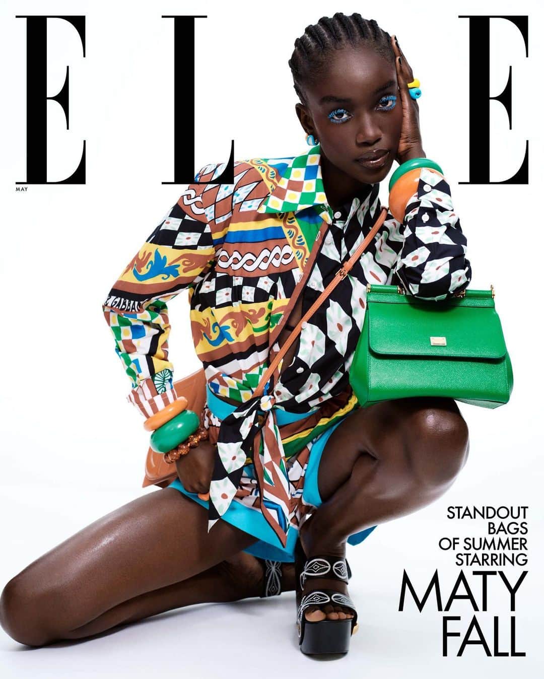 ニーナ・ガルシアのインスタグラム：「Looking for the perfect vacation bag? Well, @dibaamaty and @elleusa have a few options for you in this May digital cover shoot ☀️😎 Tap the link in bio to shop the “it” bags of the summer. — @elleusa Photographer: @sharifhamza Stylist: @alexwhiteedits Hair:  @evaniefrausto @bumbleandbumble Makeup: @gracegraceahn Manicure: #RaphaelPark Casting: @shaunbeyen @plusthreetwo Production: @veesharon @maanifest.agenc  Movement Direction: @jorgedorsinville @exposureny」