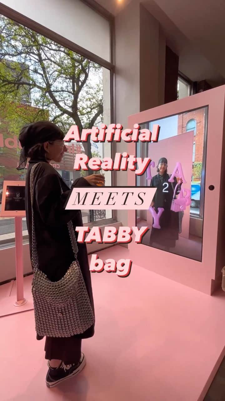 のインスタグラム：「Make this your (augmented) reality. 🤳👛💫 Stop by the Coach SoHo store to try on your Tabby bag IRL and AR or head to the @zero10.app to try it on mobile. #CoachNY #InMyTabby #TabbyBag #ArtificialReality」