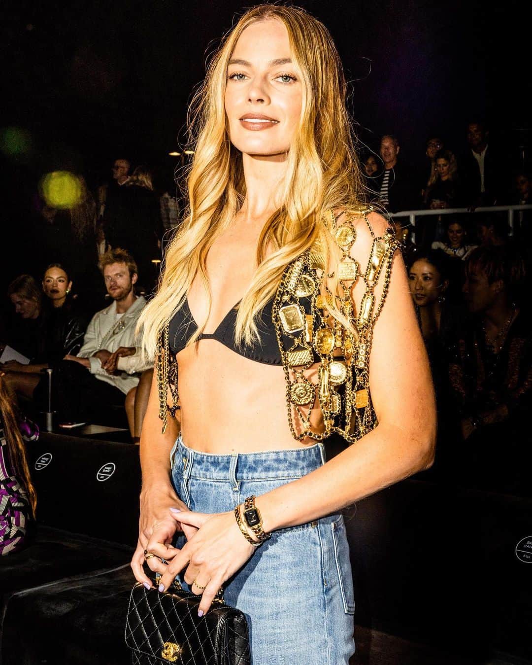 British Vogueさんのインスタグラム写真 - (British VogueInstagram)「#MargotRobbie is officially in festival mode. The #Barbie actor joined the likes #SofiaRichie and #SnoopDogg for the @ChanelOfficial Cruise 2023 show in LA last night, and put a luxe spin on festival fashion in denim flares and a bejewelled waistcoat, constructed from double C charms and the maison’s trademark leather chains. Click the link in bio for more on her look.」5月10日 20時57分 - britishvogue