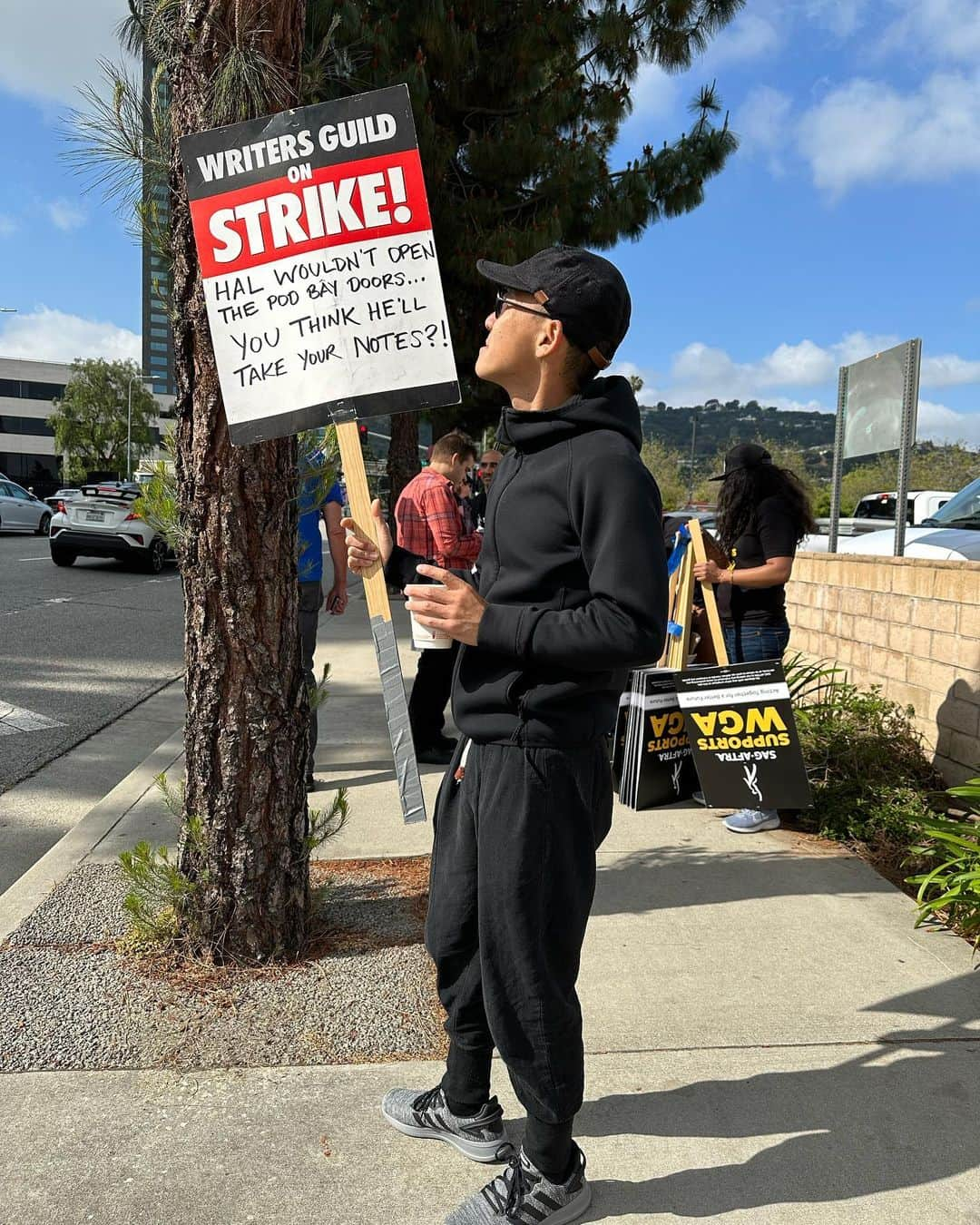 ケイコ・アジェナさんのインスタグラム写真 - (ケイコ・アジェナInstagram)「Out at the picket line today at Universal Studio. Wish we could credit the writer that wrote that sign! So many great signs out at the picket line today. @shinkawasaki and I support the writers.  Fair Wage. Union Strong. #WGAstrong, #sagaftramember and #1u」5月11日 5時36分 - keikoagena